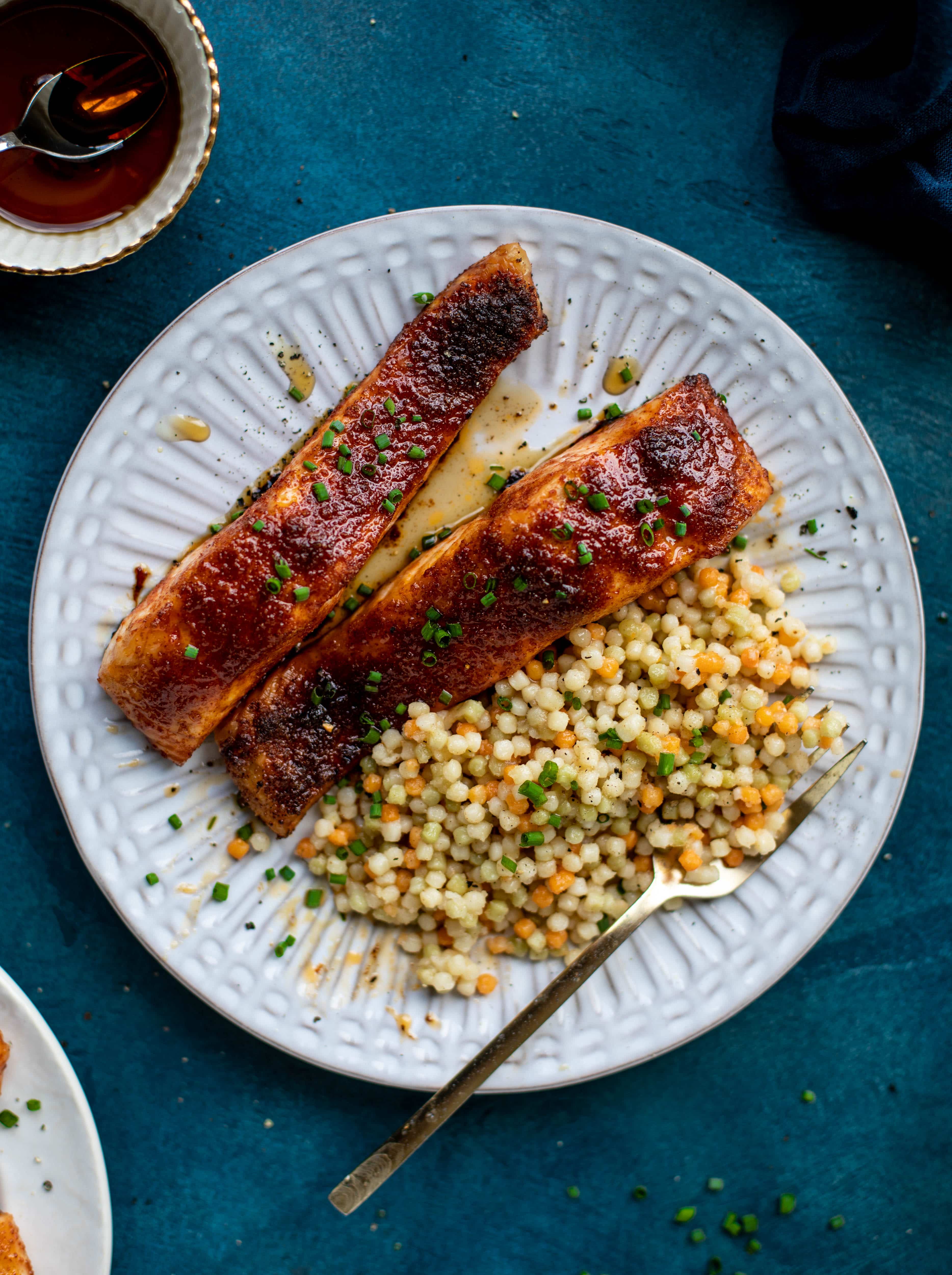 This maple bbq salmon is a quick and delicious weeknight meal. Serve with brown butter couscous and your favorite veg to round it out!