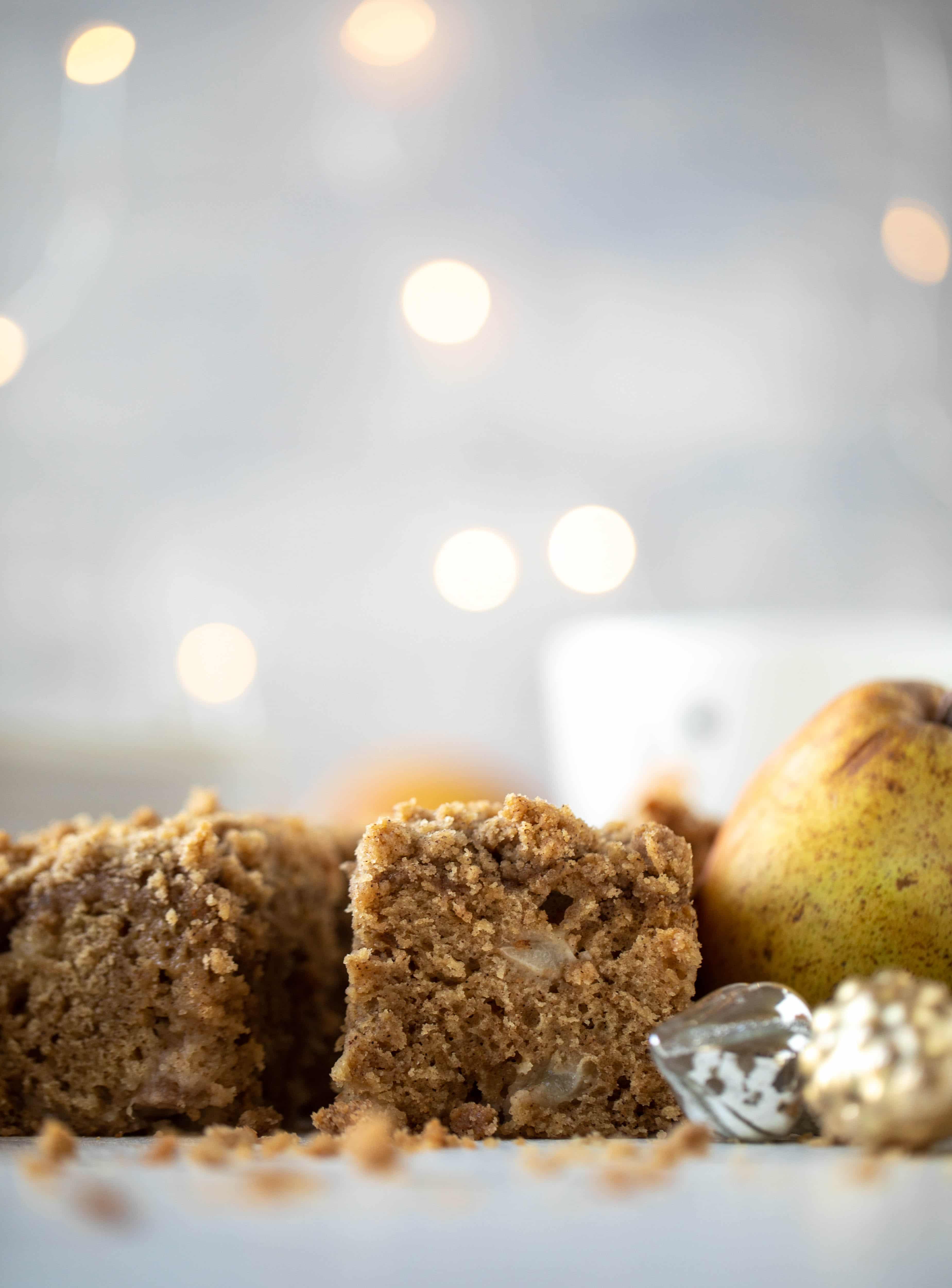 A pear coffee cake made with brown butter and greek yogurt. It's delicious for breakfast or brunch and the crumb topping is unbelievable. 