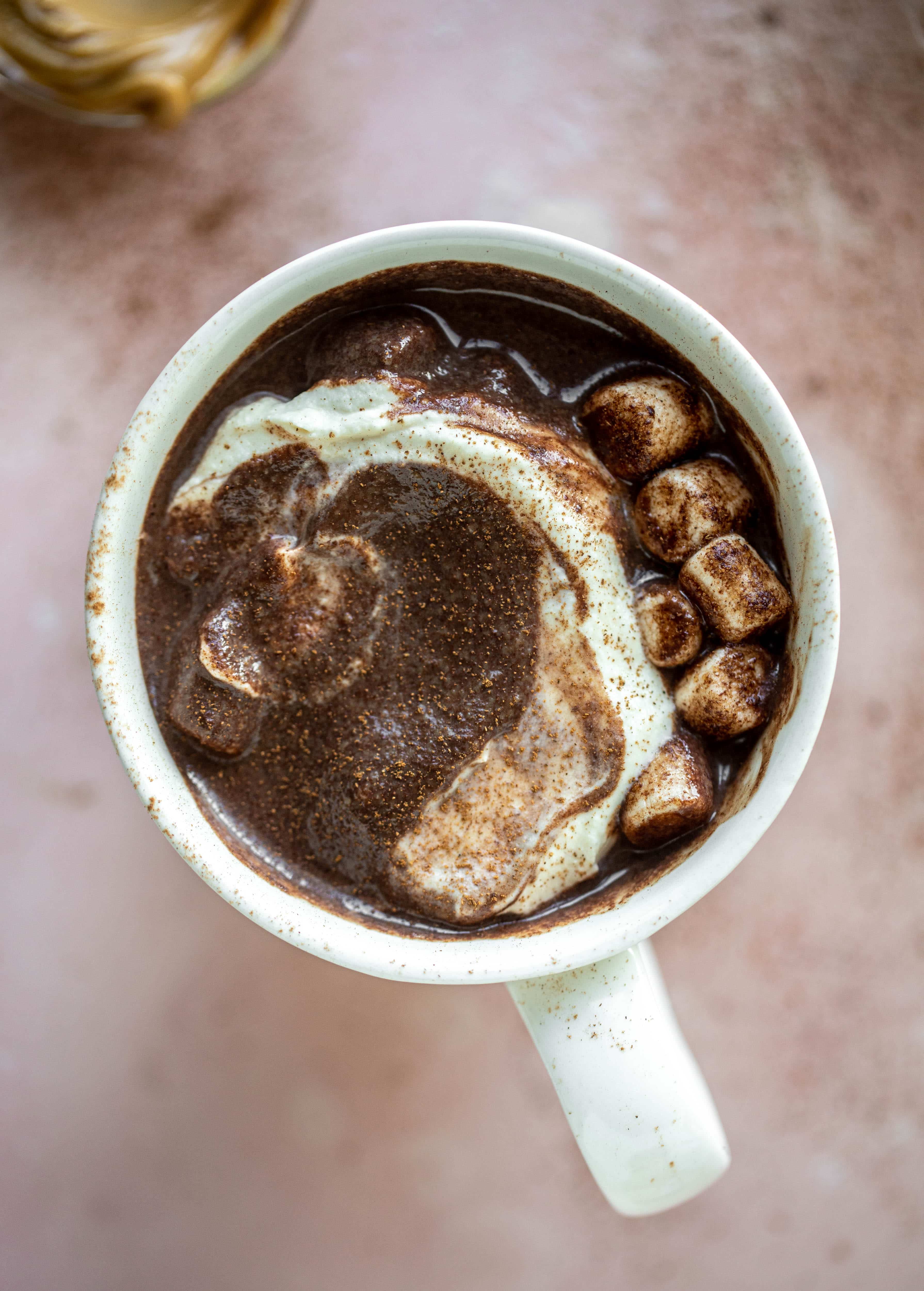 This salted peanut butter hot chocolate is a hug in a mug! It's super decadent, indulgent and cozy. Everyone's favorite flavors in one drink!