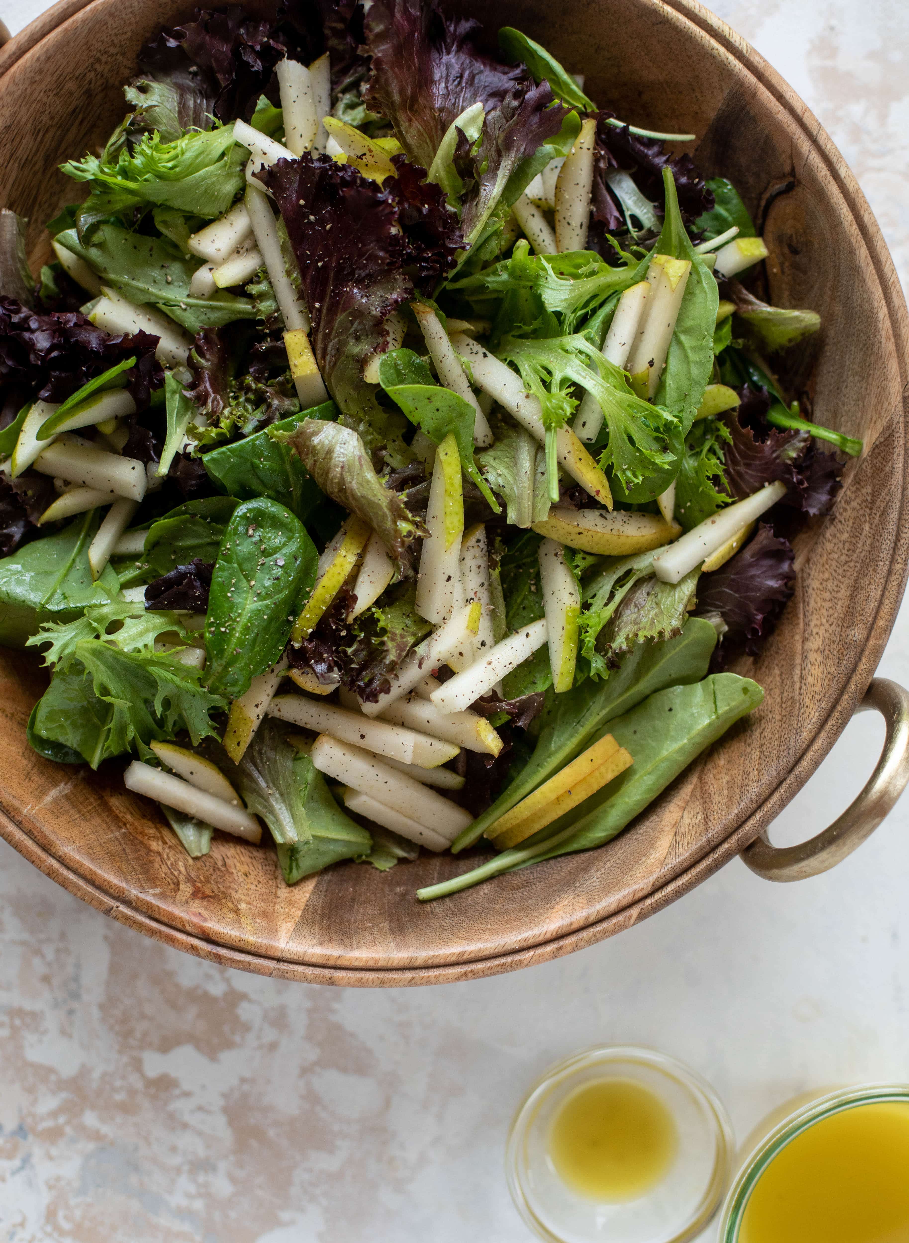 spring greens and pear for the best holiday salad