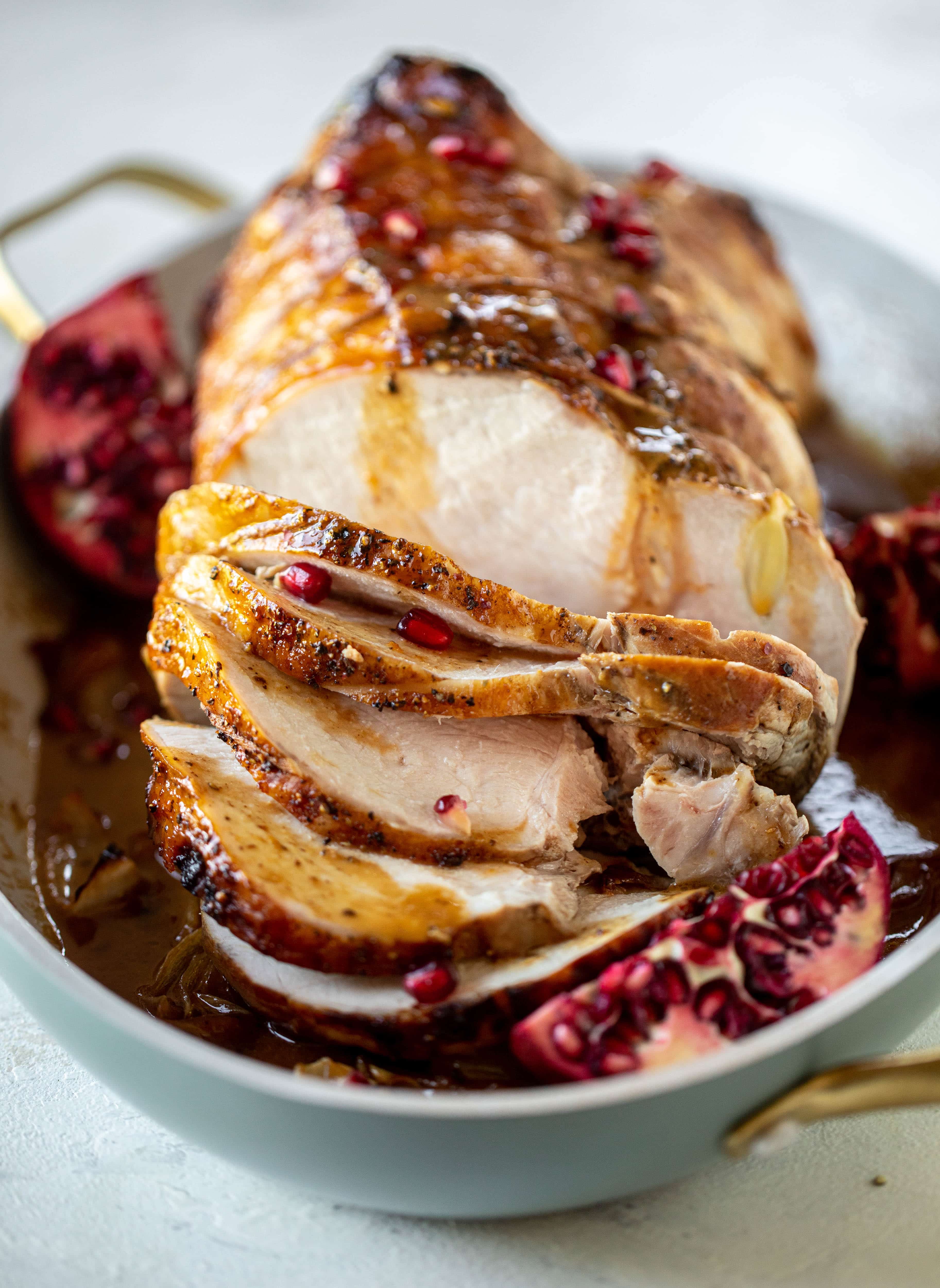 This pork loin roast is perfect for the holiday or winter season! Pomegranate and cider glazed, it's wonderful! Serve with smashed rosemary potatoes.