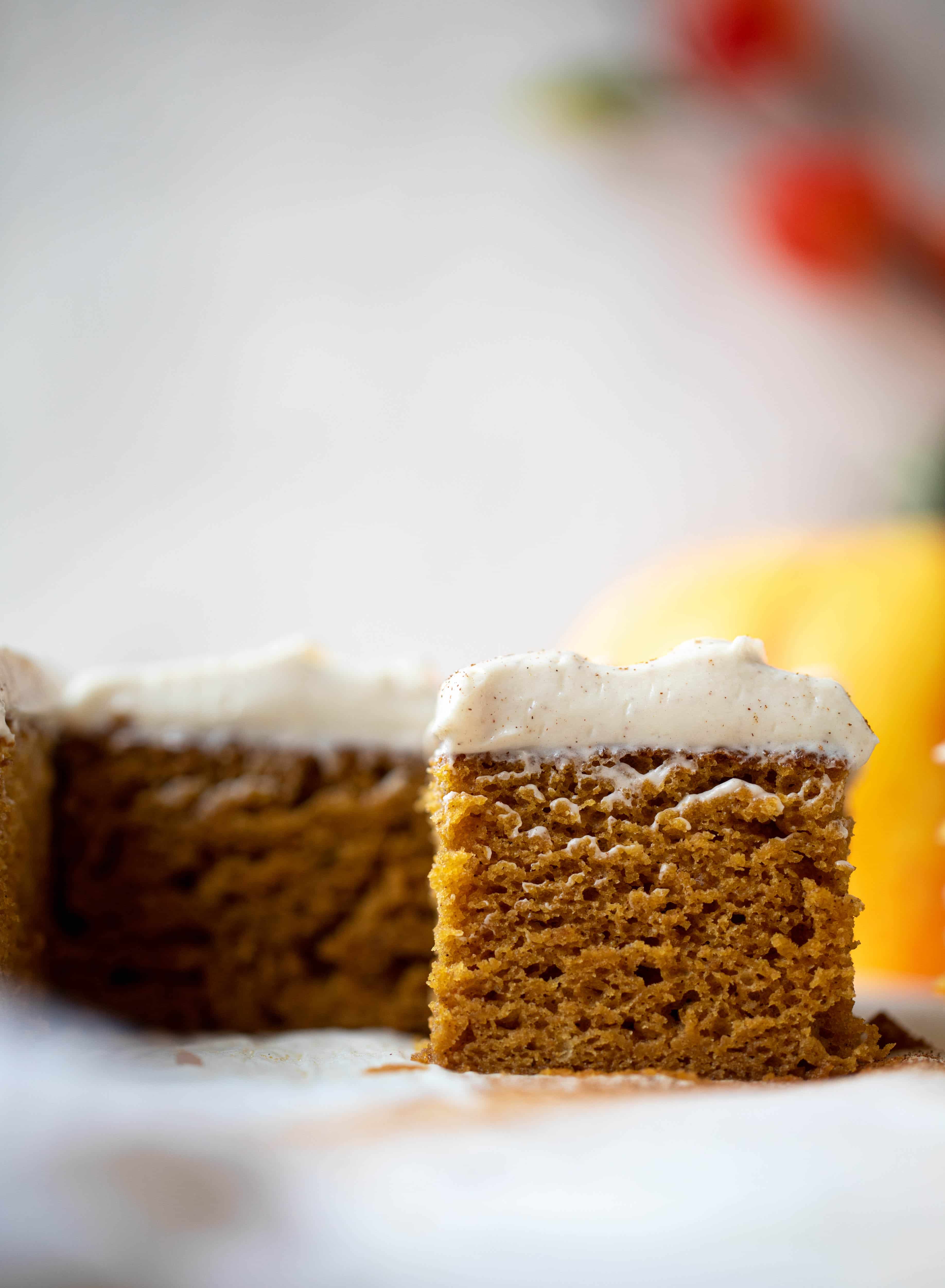 This pumpkin sheet cake is a legit pumpkin dream cake! It's so moist and fluffy and flavorful. With a blanket of cinnamon cream cheese frosting!