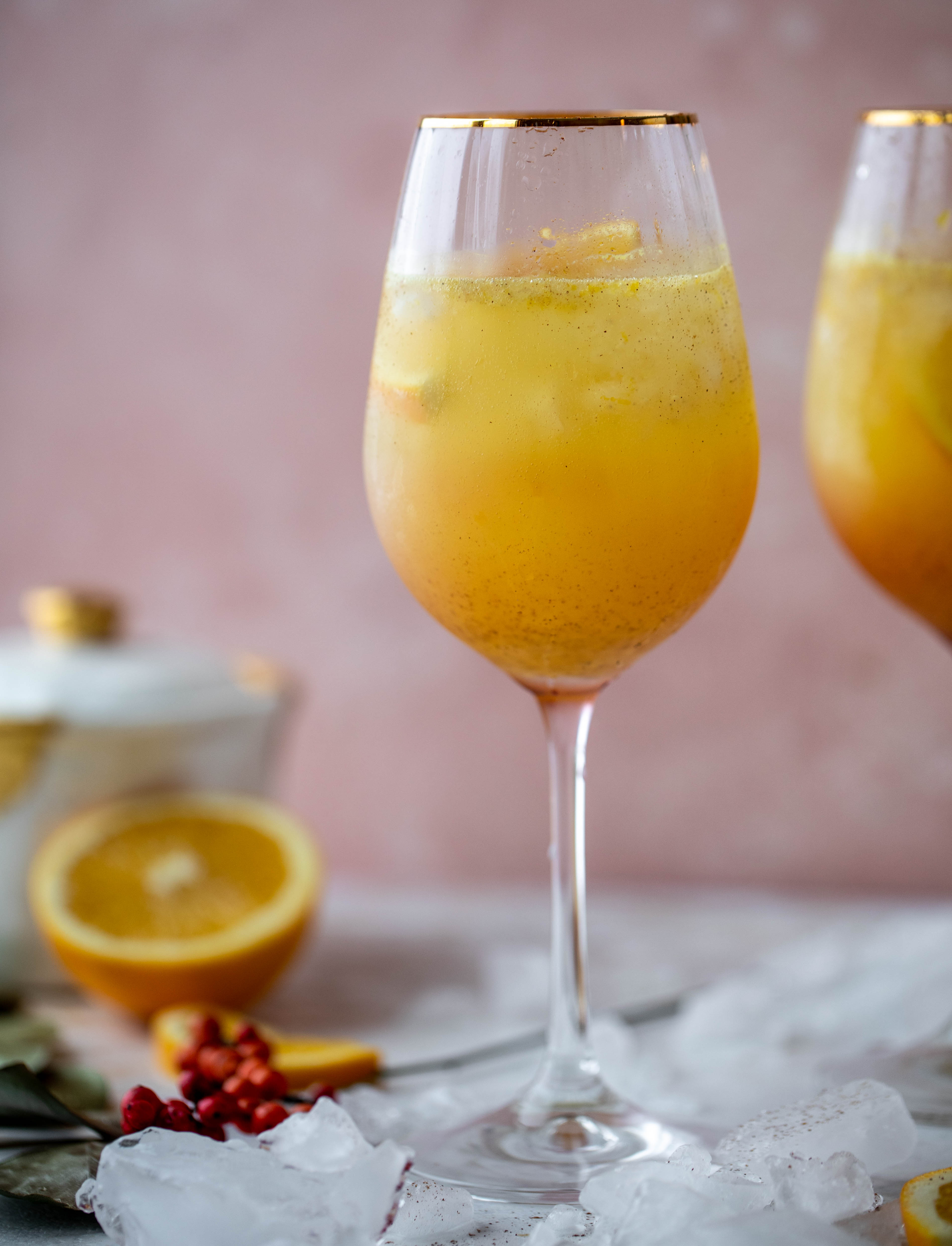 The spiced orange spritzer is a fancier mimosa and similar to an aperol spritz! A fresh spiced orange juice based mixed with prosecco and seltzer. So good!
