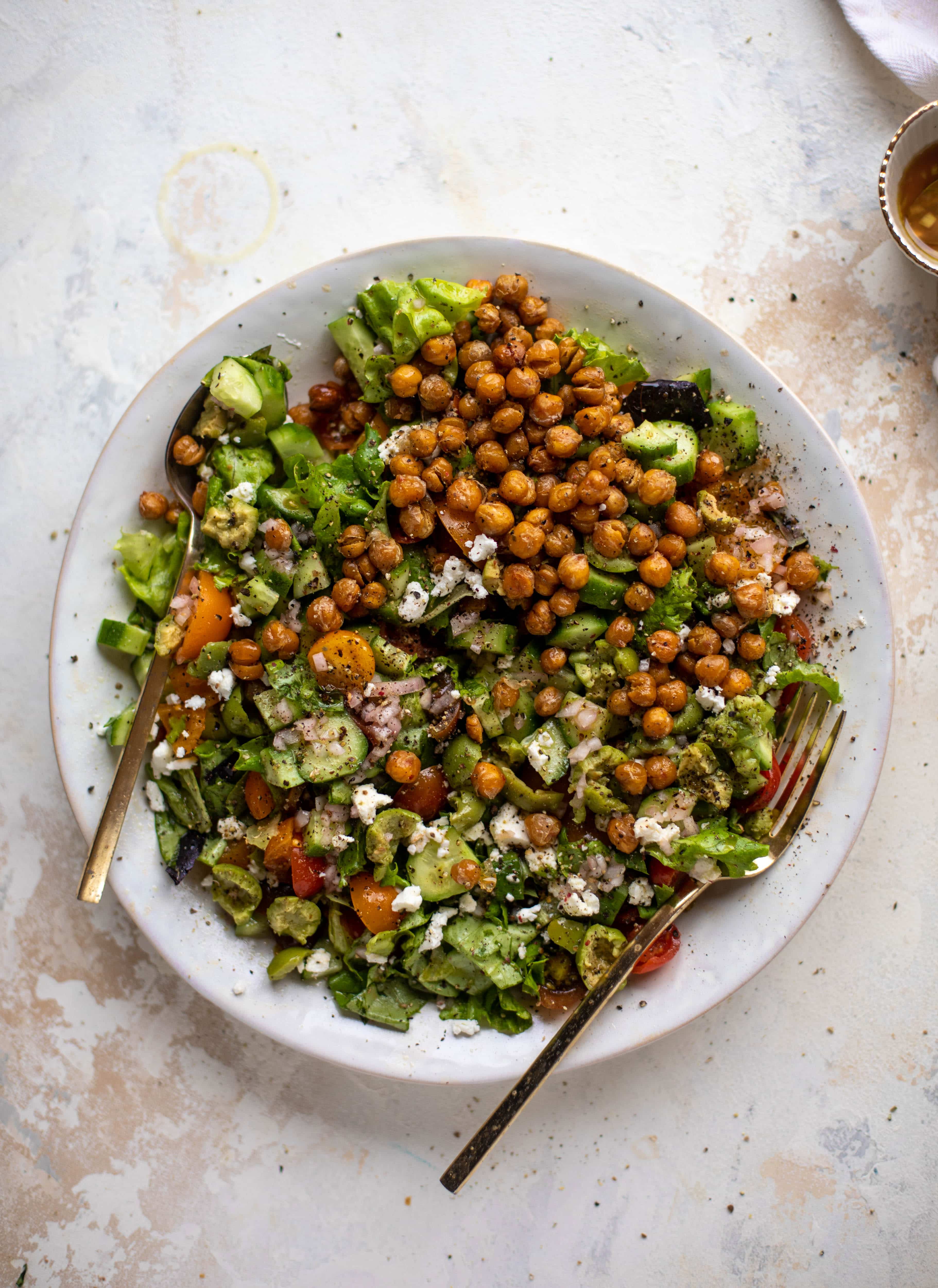 This crispy chickpea chopped salad is super simple and loaded with flavor. It's an incredible side or starter and a huge crowd pleaser! 