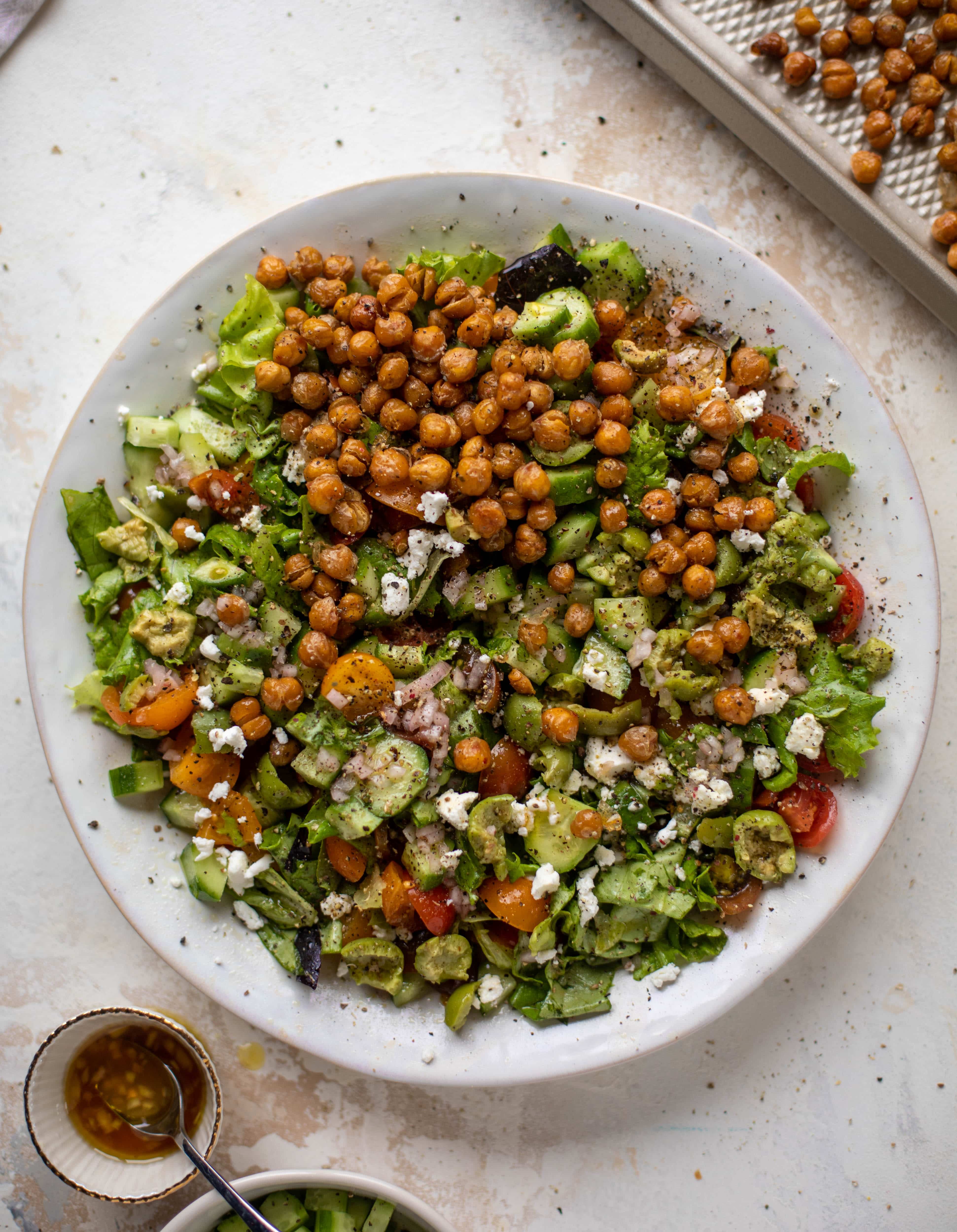 This crispy chickpea chopped salad is super simple and loaded with flavor. It's an incredible side or starter and a huge crowd pleaser! 