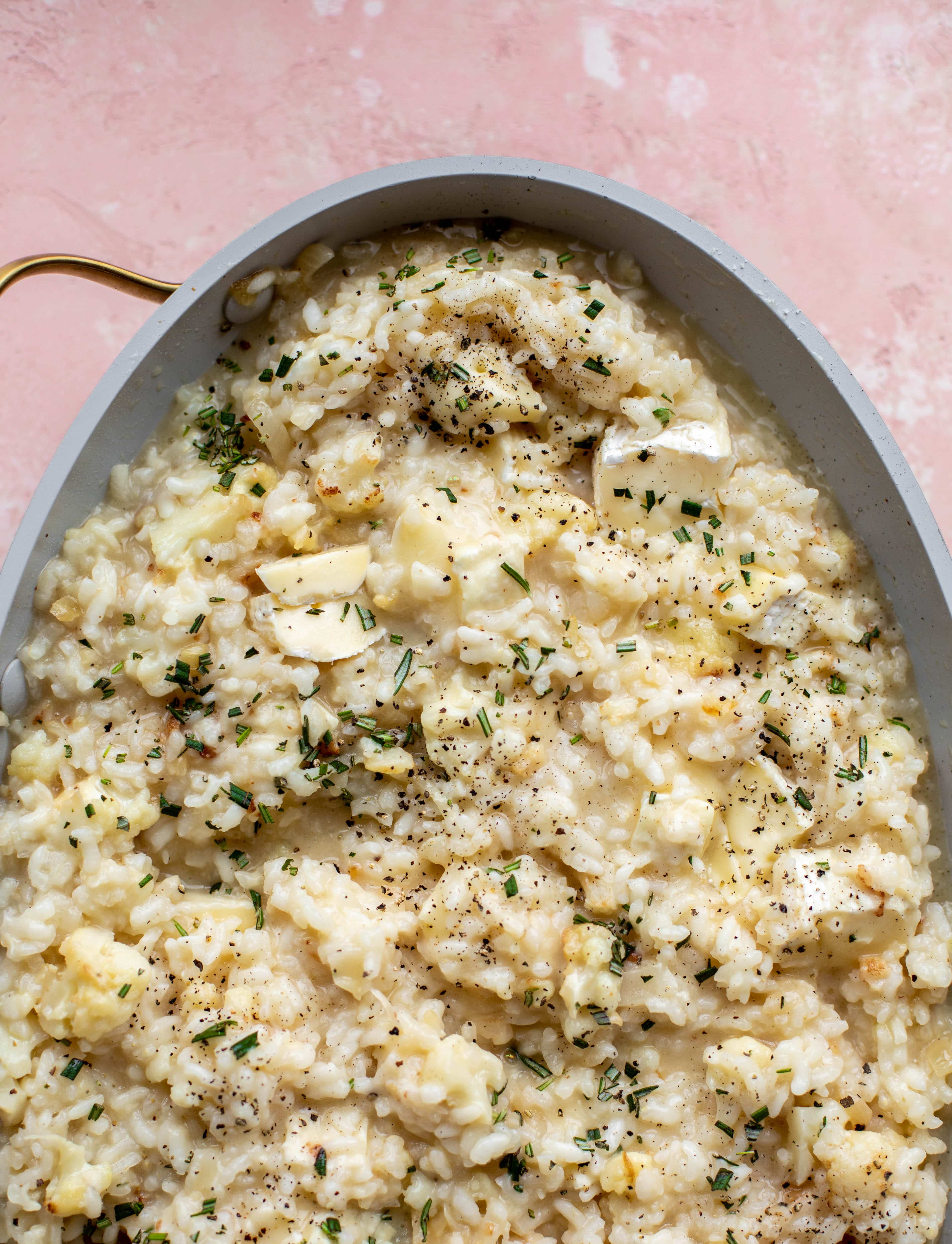 This baked risotto is delicious and so much easier than the stovetop version! Toasted cauliflower, brie cheese and rosemary make this taste incredible.