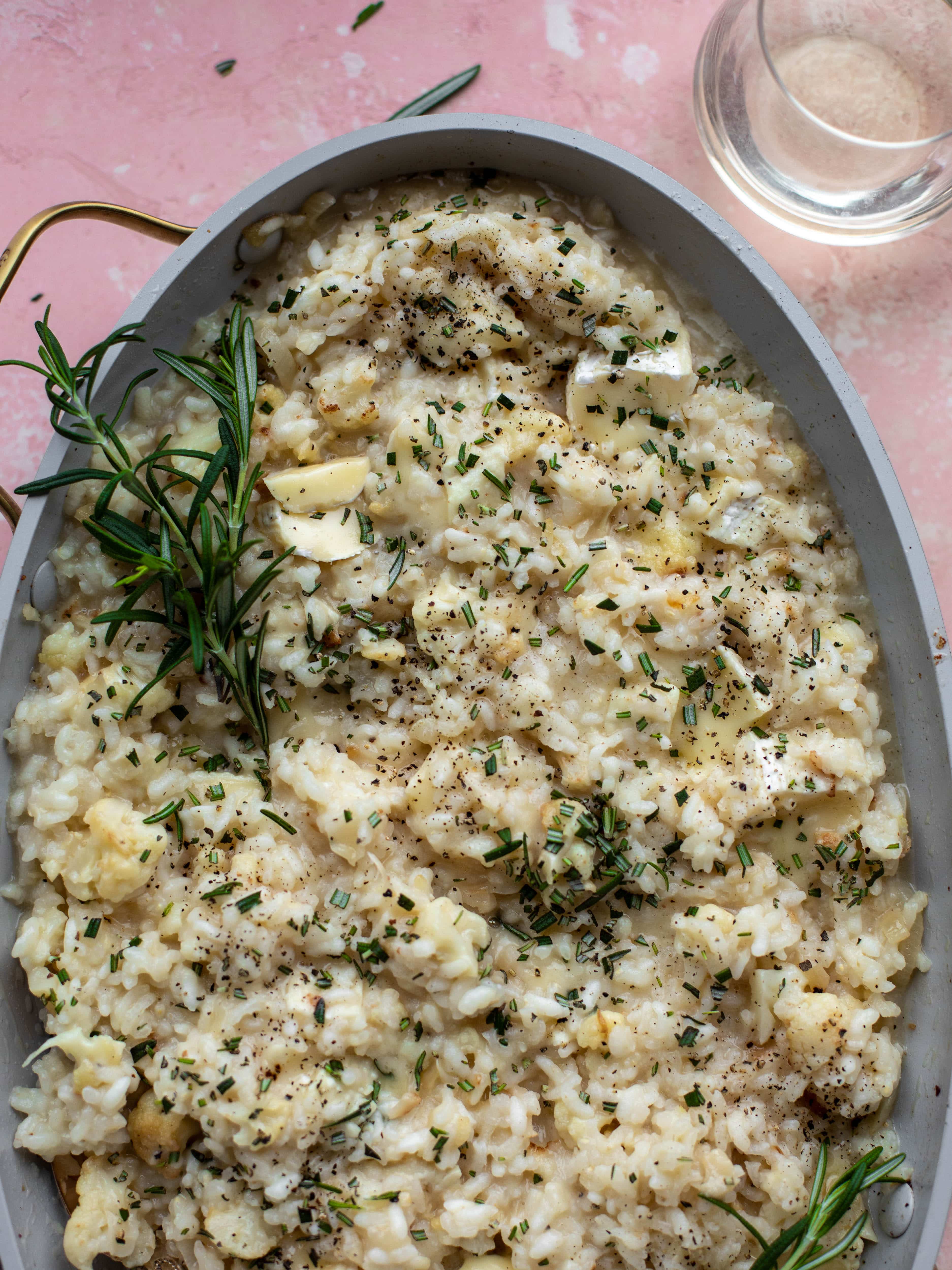 This baked risotto is delicious and so much easier than the stovetop version! Toasted cauliflower, brie cheese and rosemary make this taste incredible.