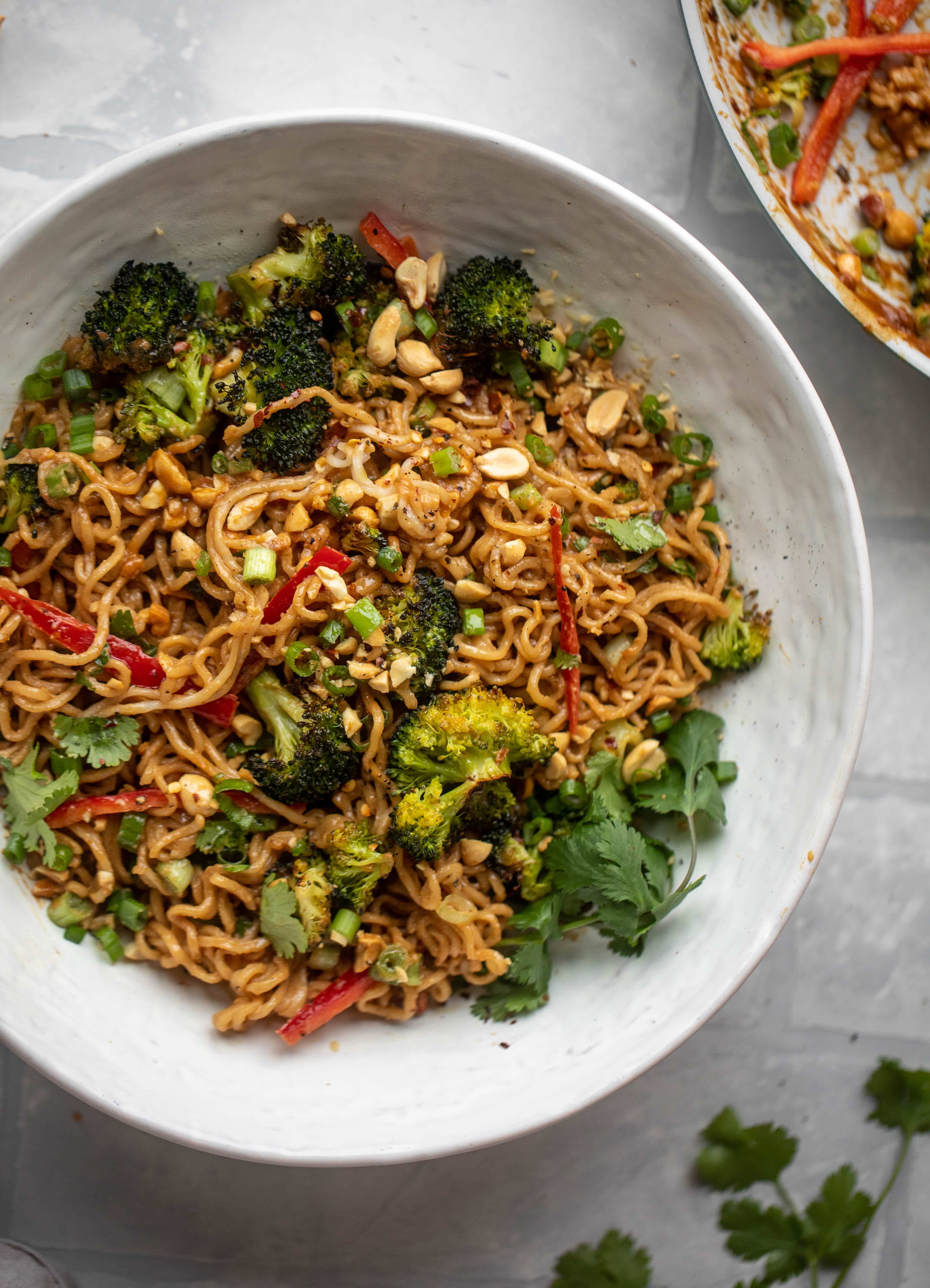 These are the most delicious peanut noodles! Tossed with roasted broccoli, red peppers, scallions, peanuts and an incredibly flavorful sauce!
