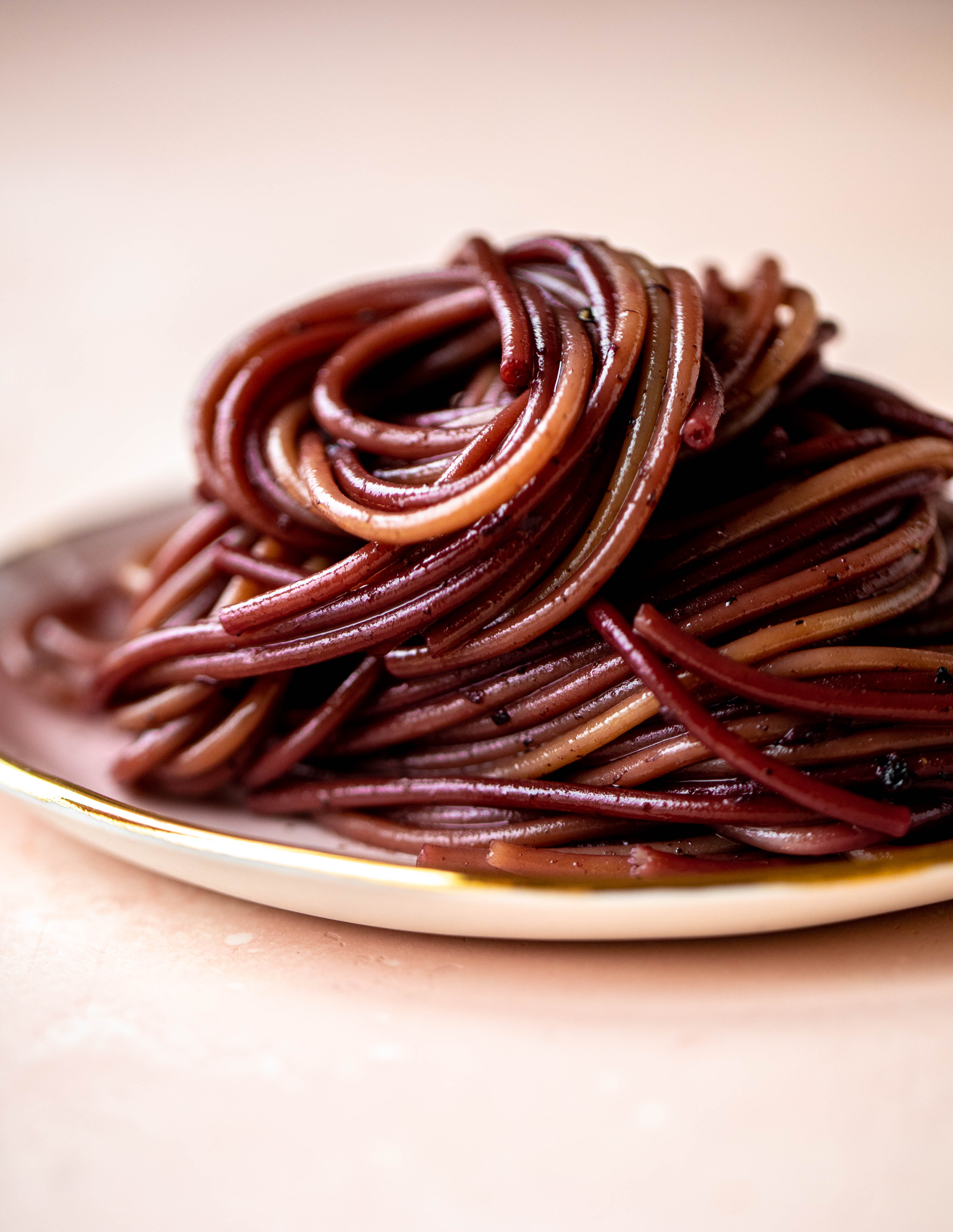 This red wine pasta is an easy, flavorful dinner! Red wine cooked down with garlic and butter until sauce-like. Throw in noodles and you have dinner!