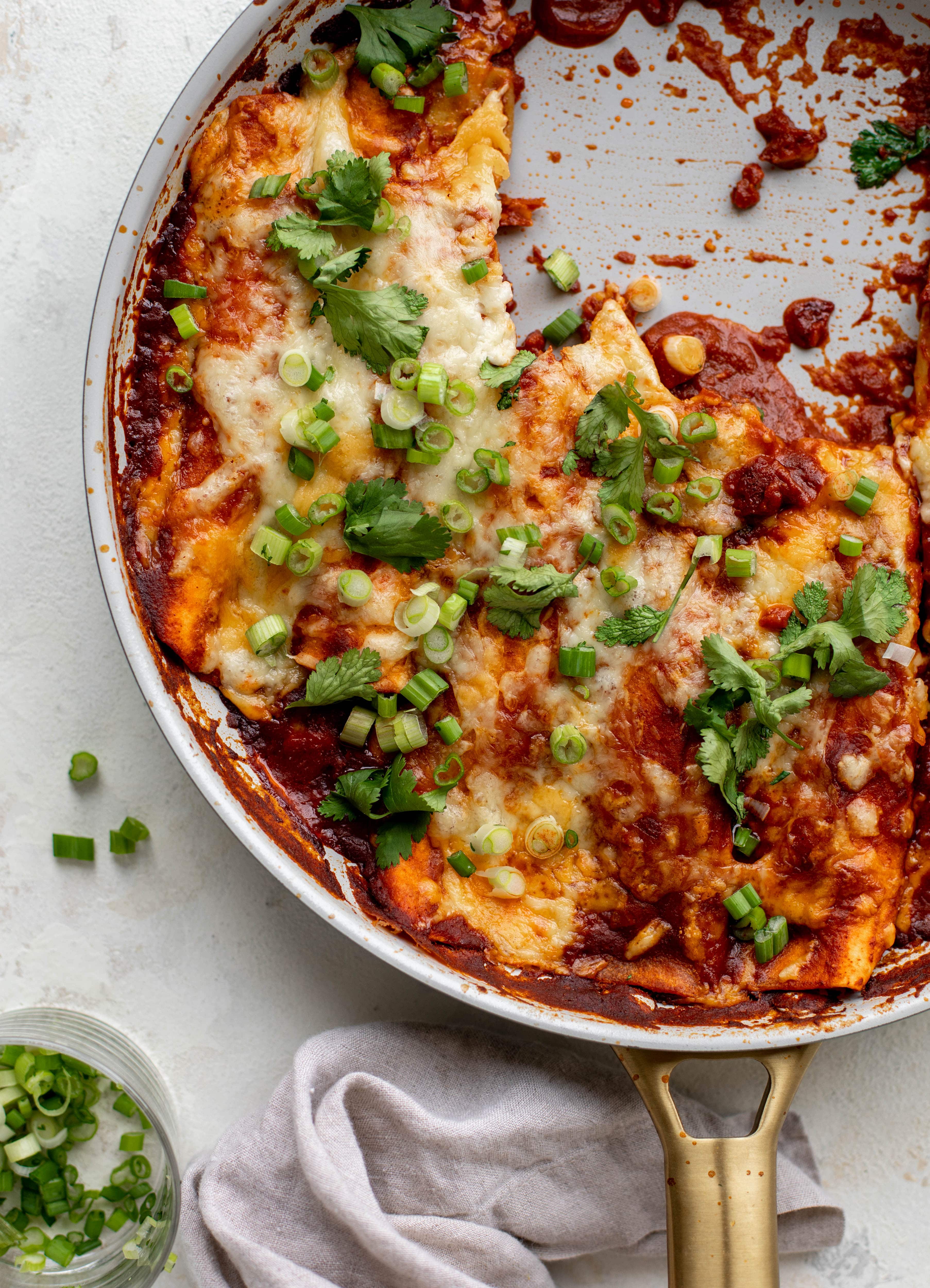 Chipotle chicken skillet enchiladas are loaded with flavor and come together so quickly! They are the perfect spicy weeknight meal.