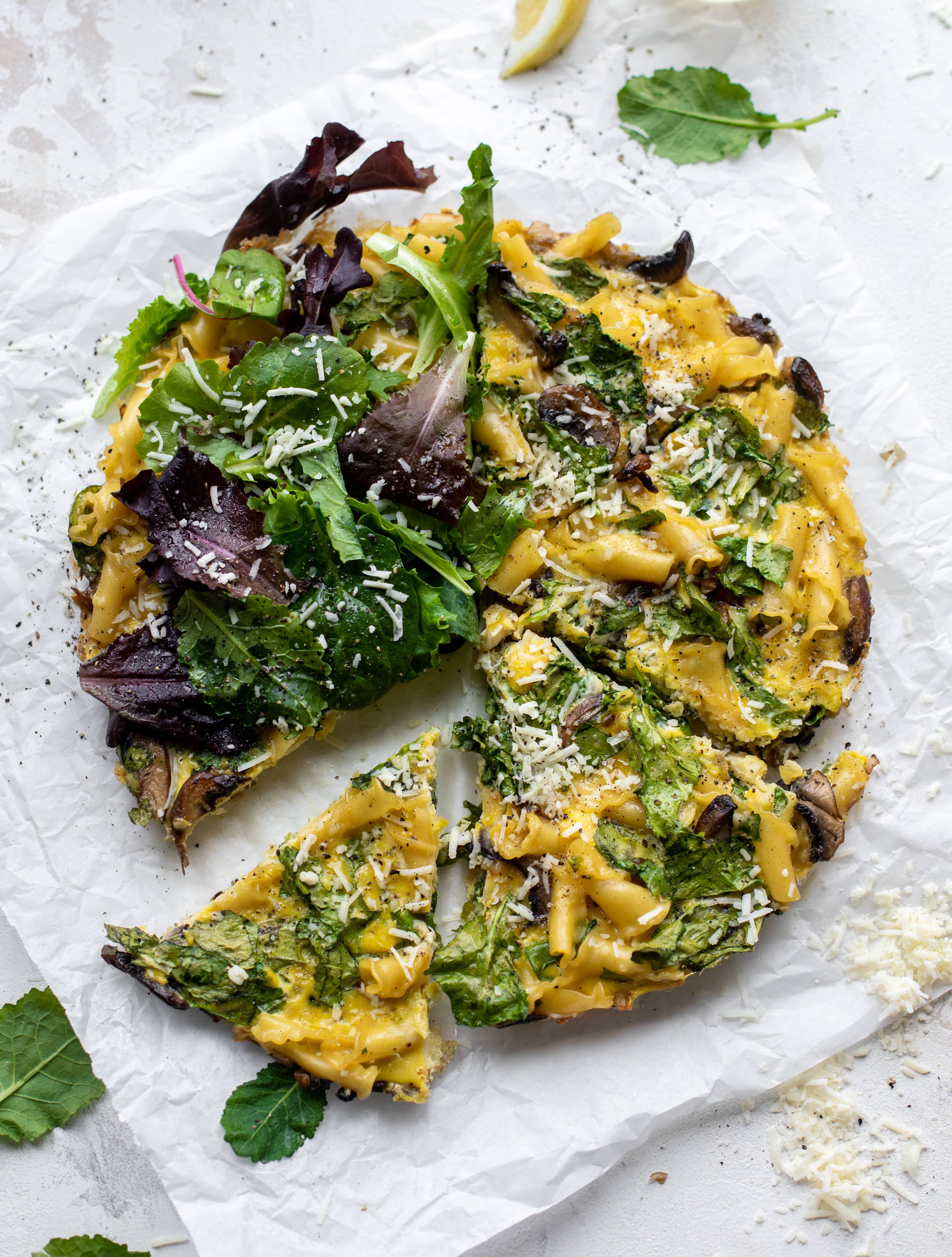 This super easy pasta frittata uses leftover ingredients and can be prepped ahead of time. Leftovers are great and it's satisfying and delicious!