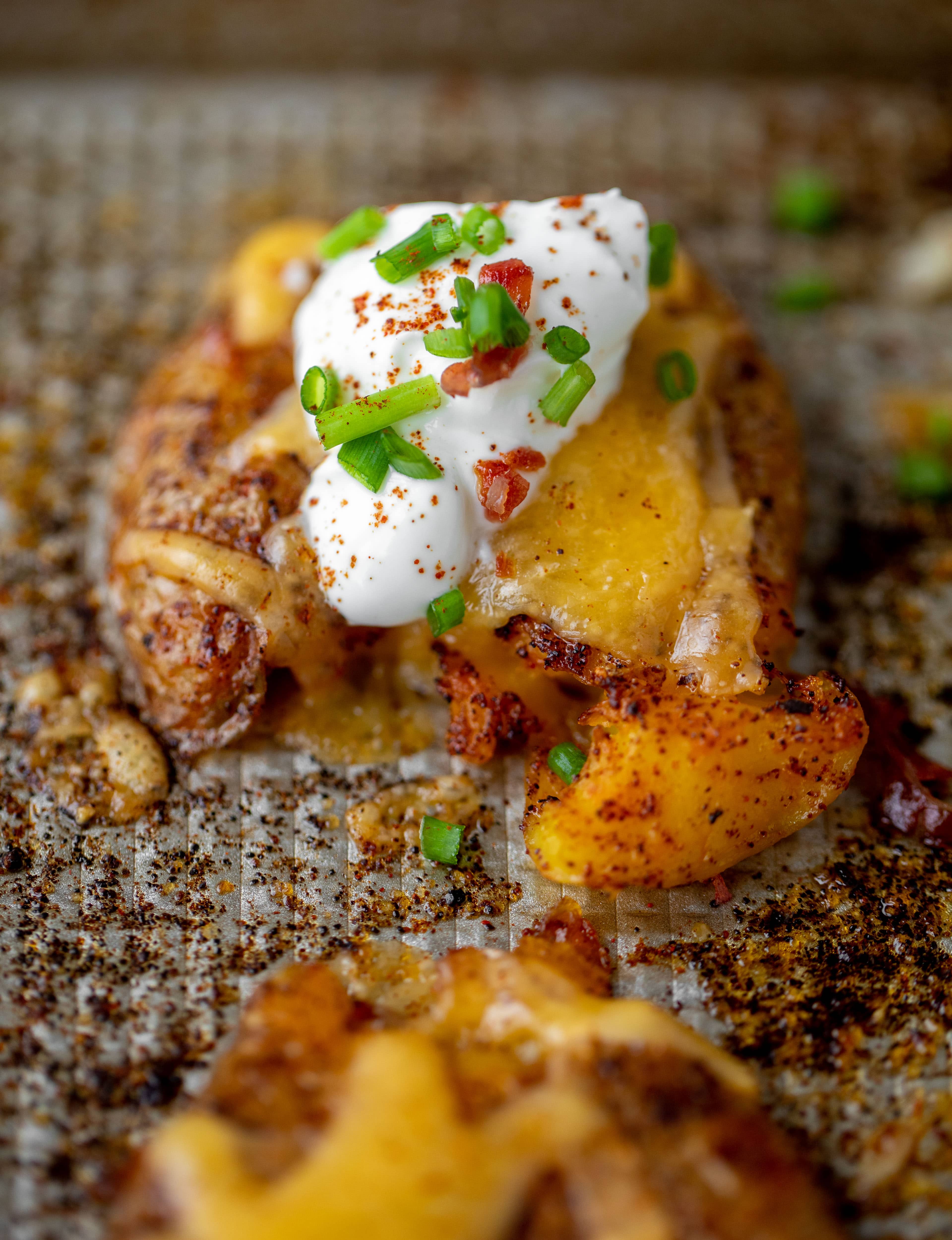 chipotle cheddar smashed potatoes with sour cream and chives
