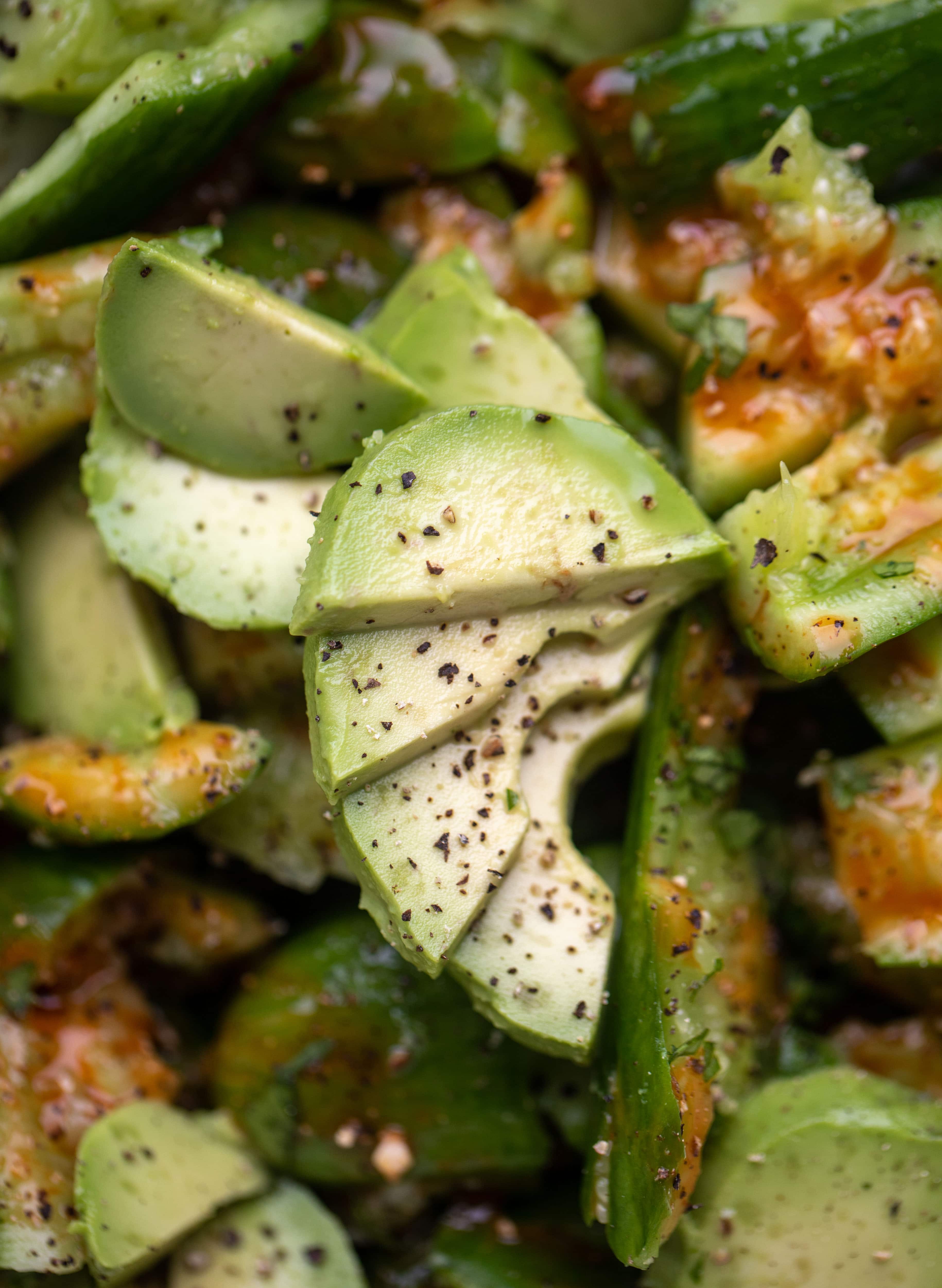 This smashed buffalo cucumber salad is filled with tons of buffalo wing flavor! Avocado, blue cheese, peanuts and lime juice make this irresistible. 