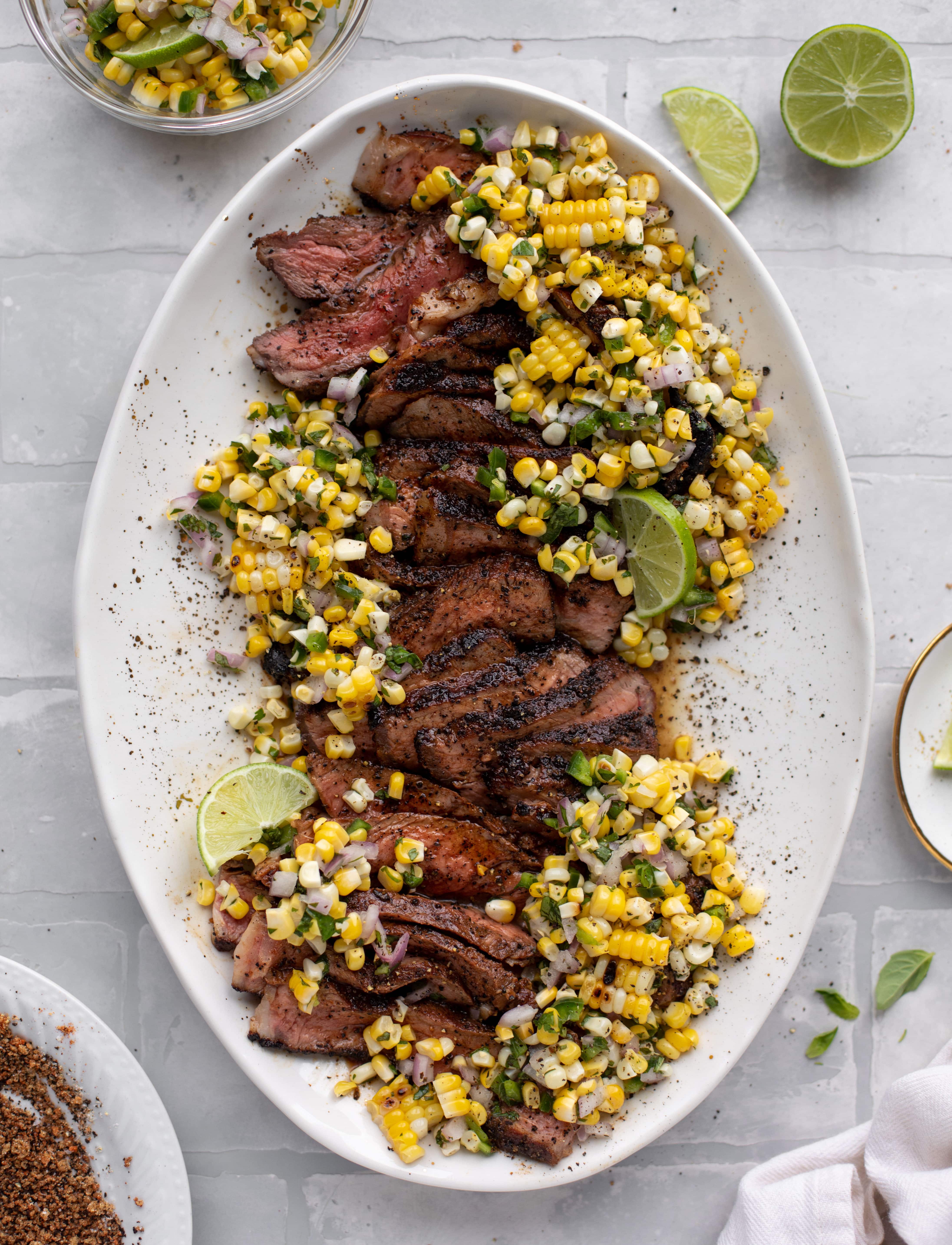 This coffee crusted steak is incredibly flavorful! Topped with a fresh and bright herbed corn salsa, it's the perfect meal to kick off summer.