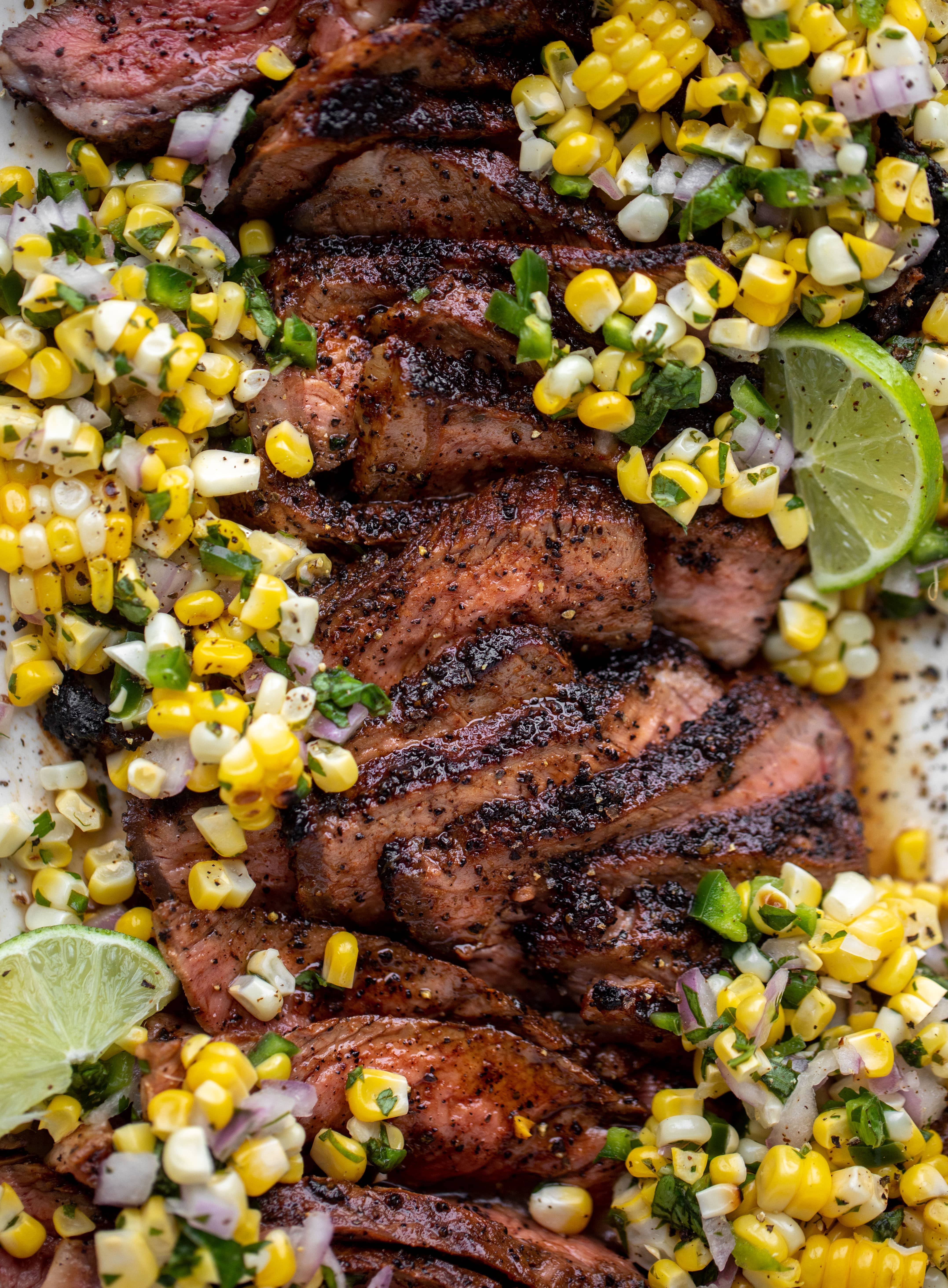 This coffee crusted steak is incredibly flavorful! Topped with a fresh and bright herbed corn salsa, it's the perfect meal to kick off summer.