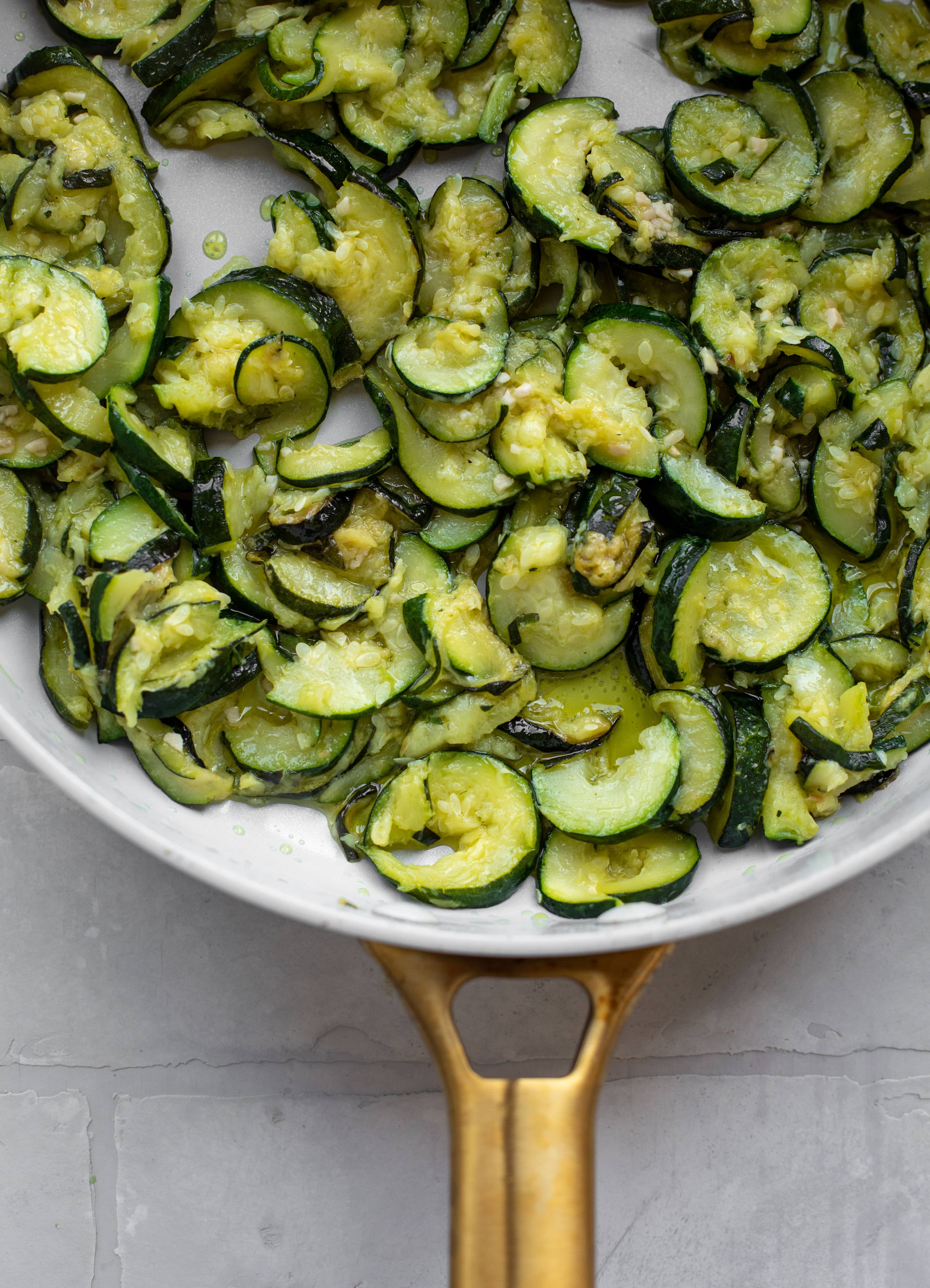 melted zucchini and garlic in skillet
