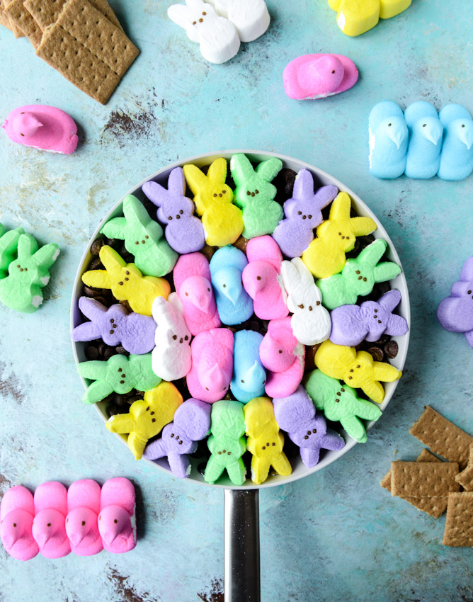 Peeps skillet s'mores! Indoor chocolate peanut butter s'mores using Peeps marshmallows make for the cutest spring treat! Best for using up those Peeps! I howsweeteats.com #peeps #smores