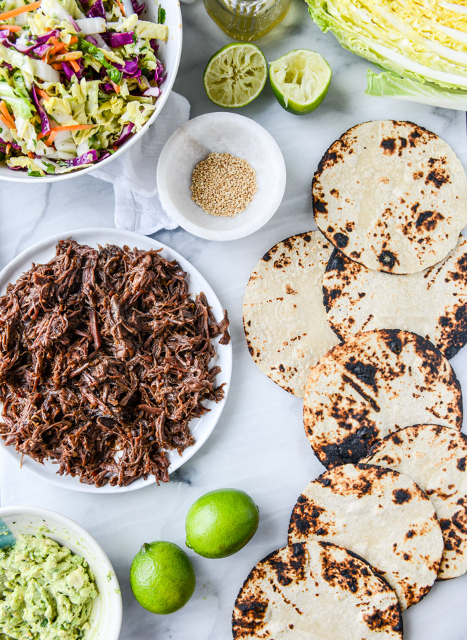 slow cooker sweet + spicy short rib tacos with sesame guacamole I howsweeteats.com