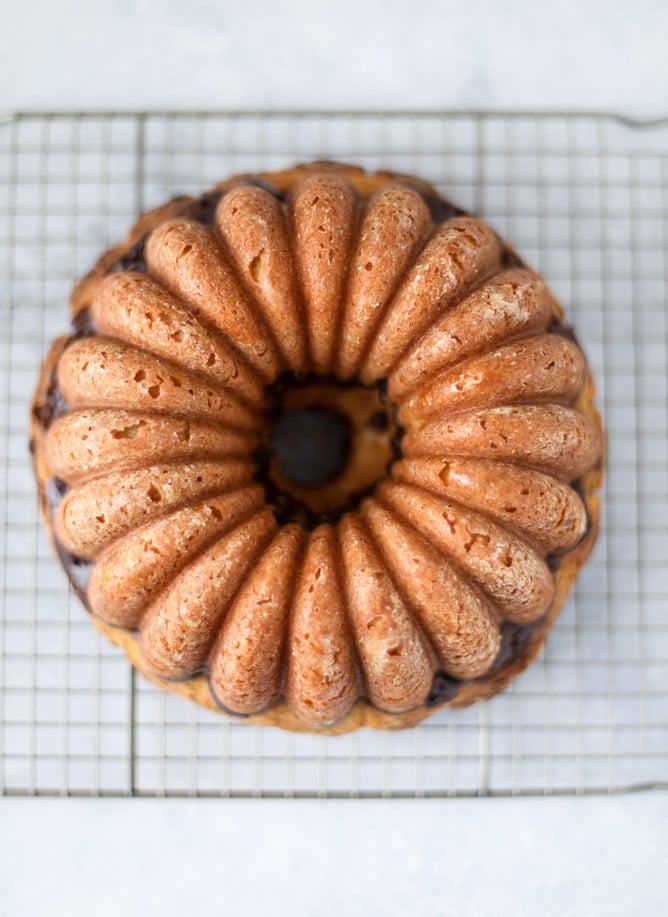 This blood orange coffee cake is made with greek yogurt and the most delicious blood orange glaze! Perfect for a winter breakfast or brunch! I howsweeteats.com #bloodorange #coffeecake