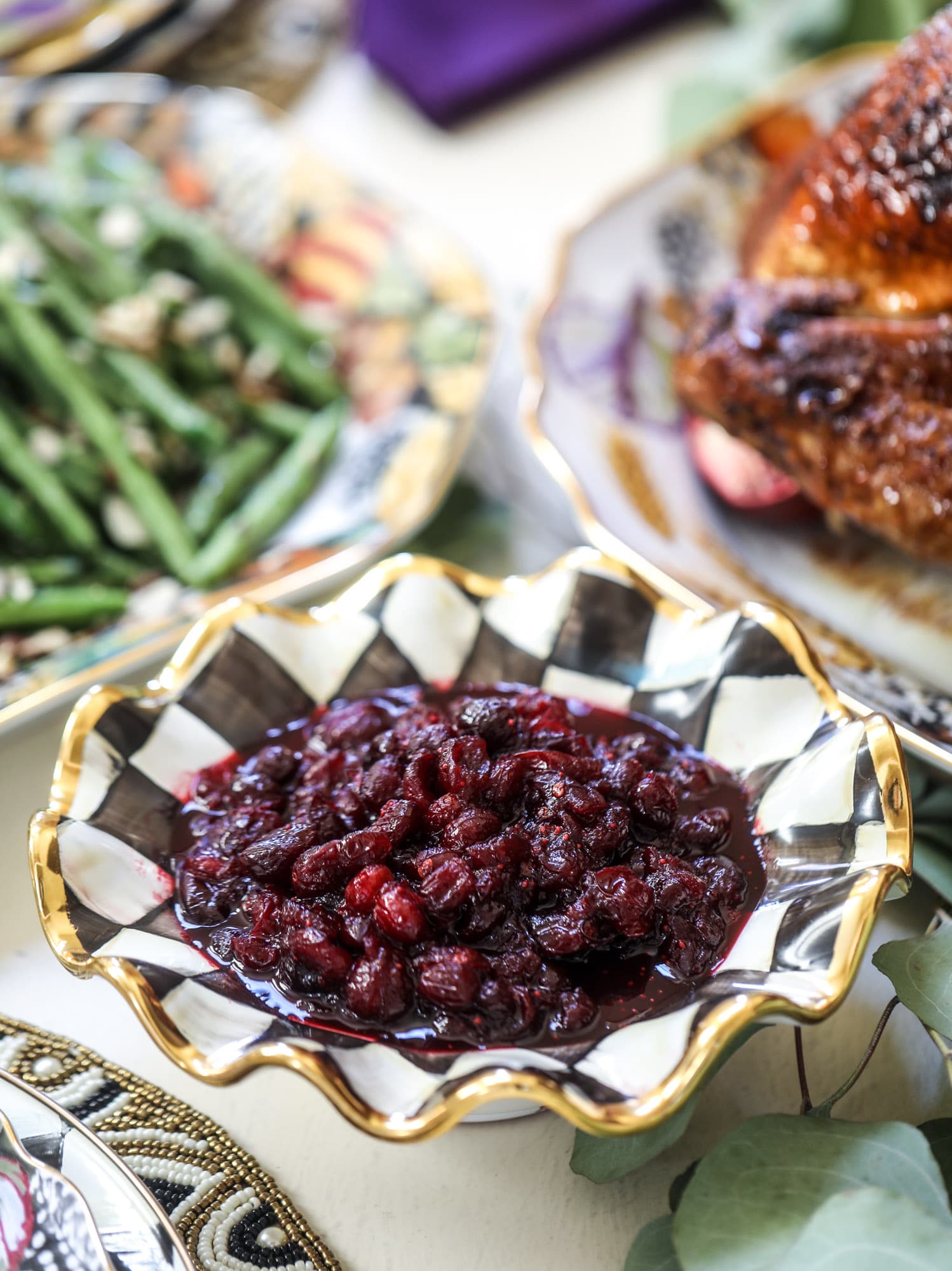 This cranberry chutney is not your traditional Thanksgiving side dish! Chipotle peppers and adobo sauce give this cranberry chutney a little kick - a touch of heat that works so well with the sweet. As a side or spread on sandwiches, it's perfect for the holidays! I howsweeteats.com #cranberry #chutney