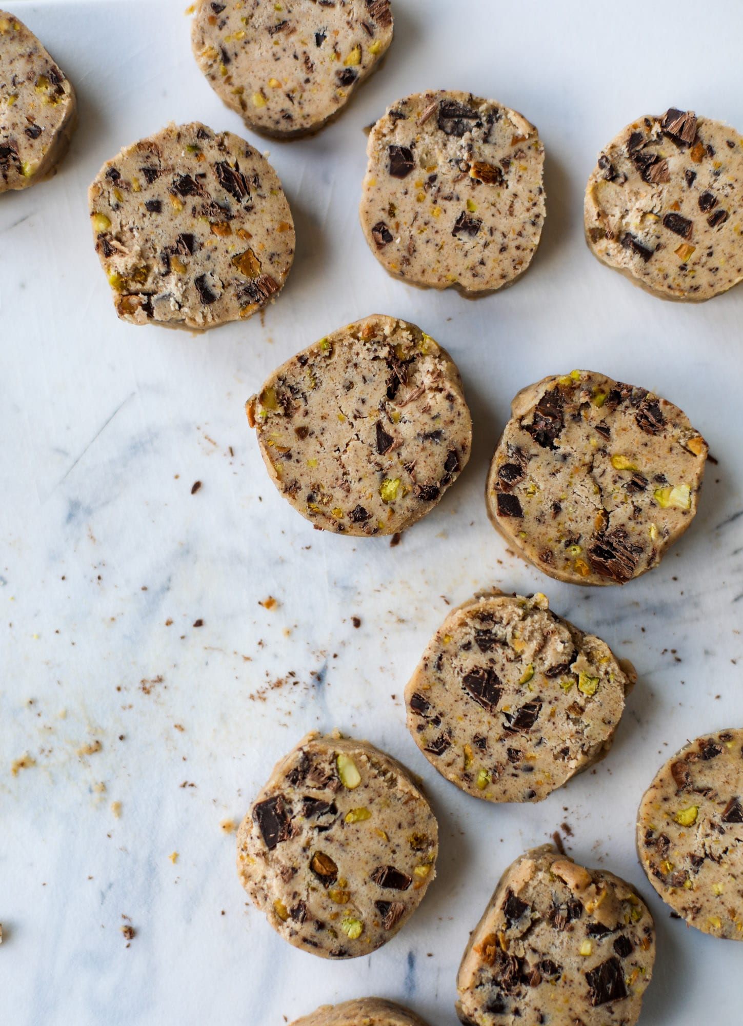 This chocolate pistachio shortbread recipe is the perfect combo of sweet and salty in a crunchy cookie! Melty, rich dark chocolate comes together with roasted, salted pistachios to make a delicious crunchy cookie! I howsweeteats.com #chocolate #pistachio #shortbread