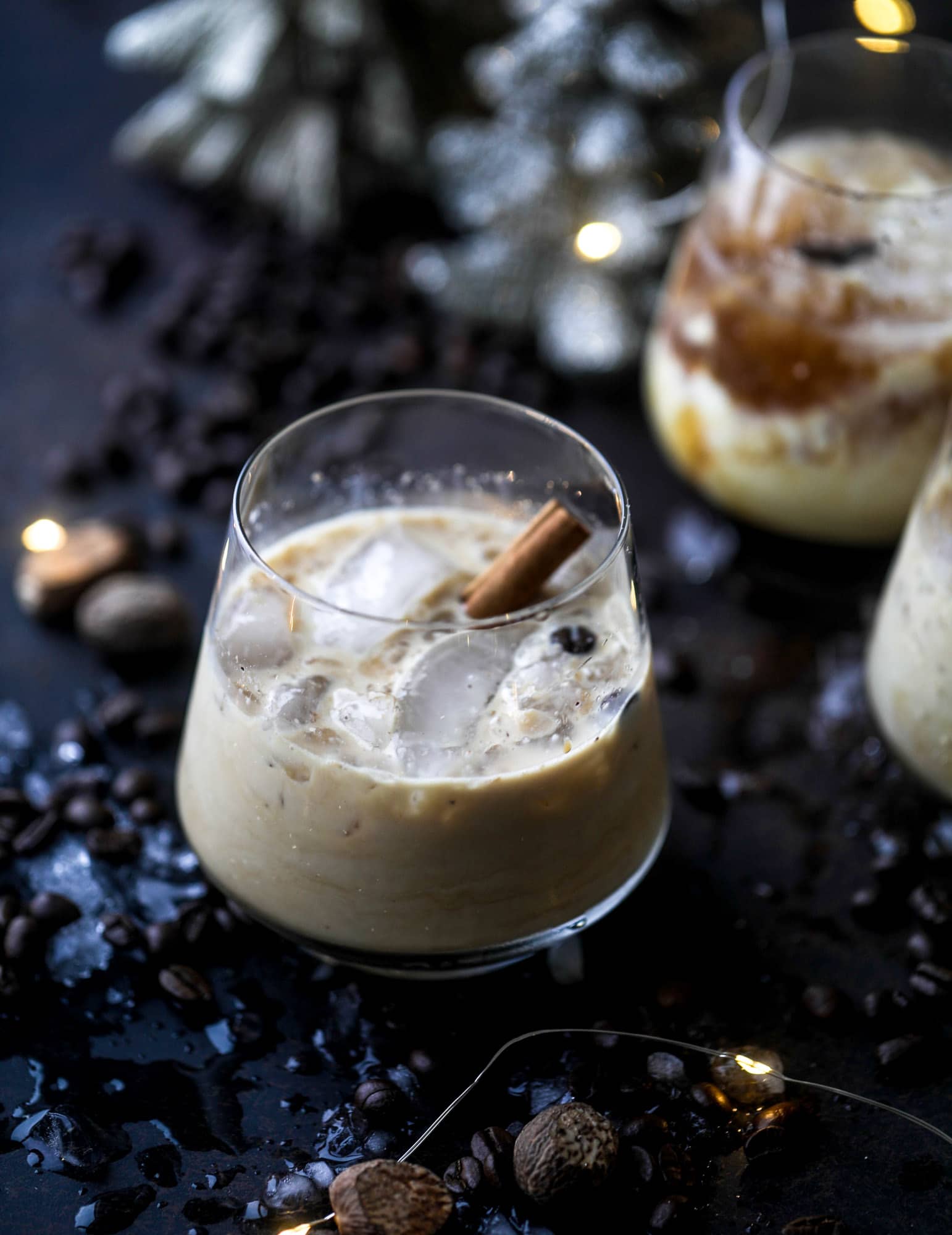 The eggnog white russian cocktail is perfect for the holiday season! Coffee liqueur mixed with vanilla vodka and eggnog and topped with freshly grated nutmeg is the perfect treat and oh-so festive! I howsweeteats.com #eggnog #whiterussian