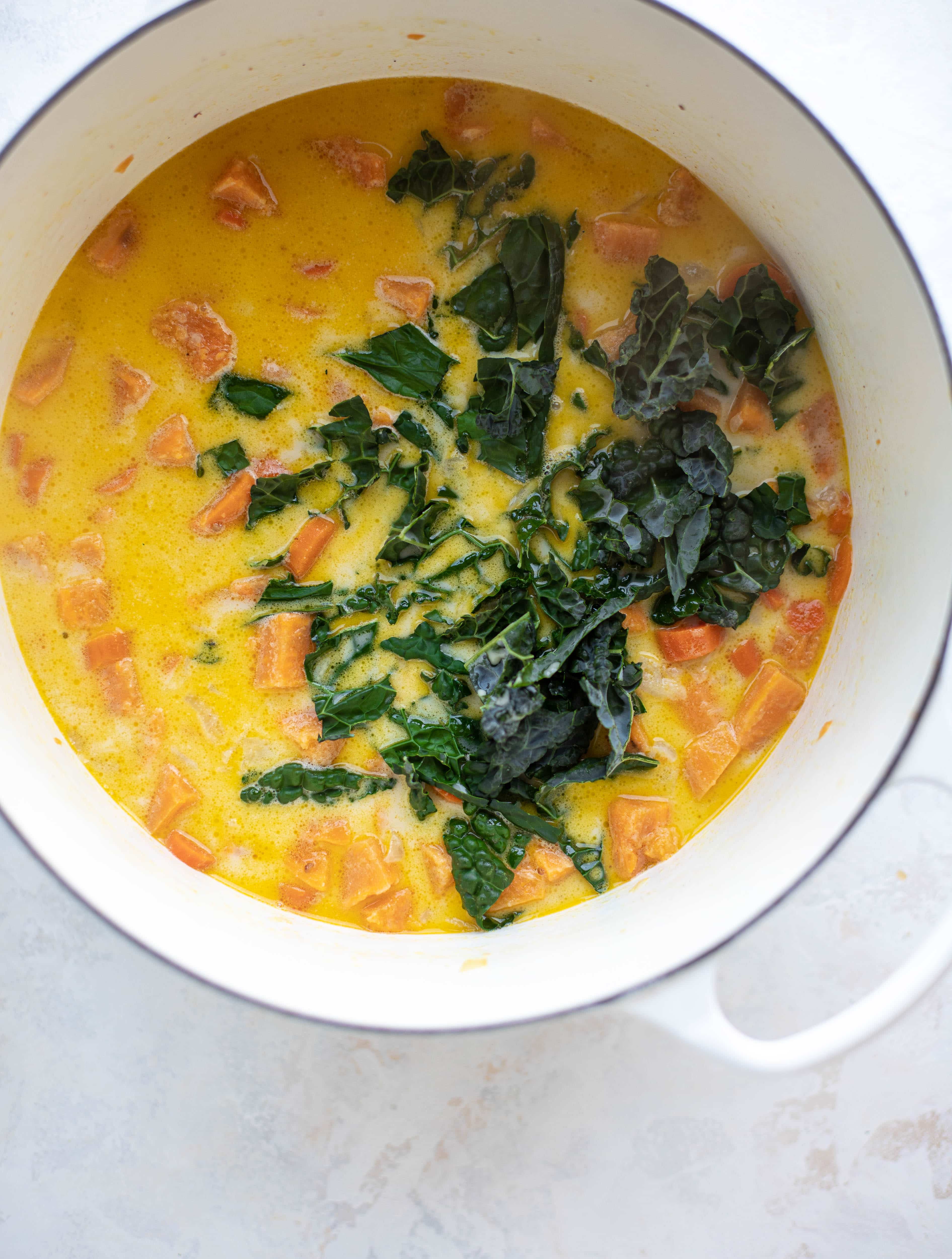 This sweet potato chowder is a hug in a bowl! Made with lots of greens and crunchy pancetta and pepitas for topping, it's a perfect weeknight meal.