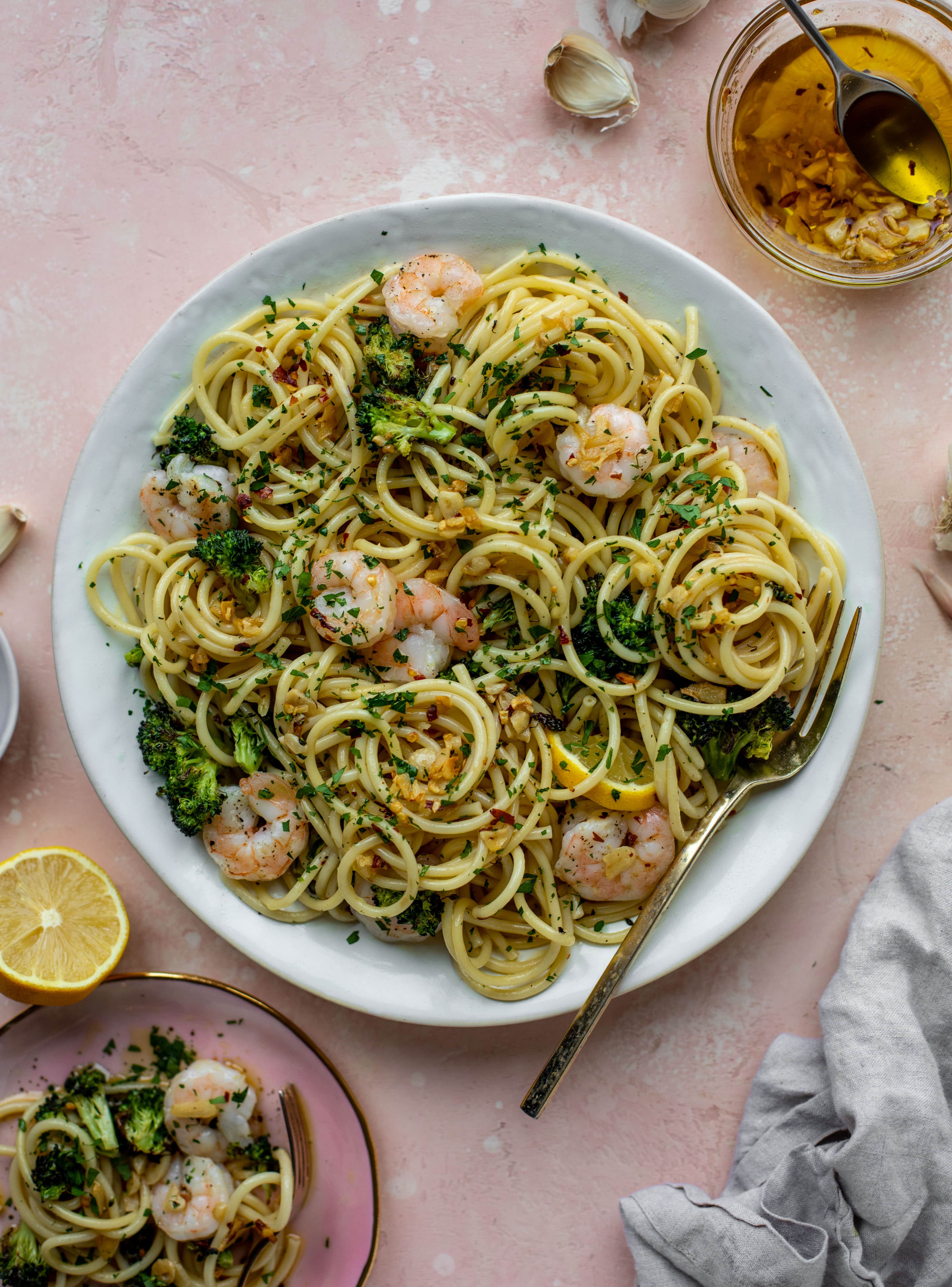 This garlic sauce pasta is incredible! Roasted shrimp and broccoli twirled with garlic oil noodles and crushed red pepper. Divine!