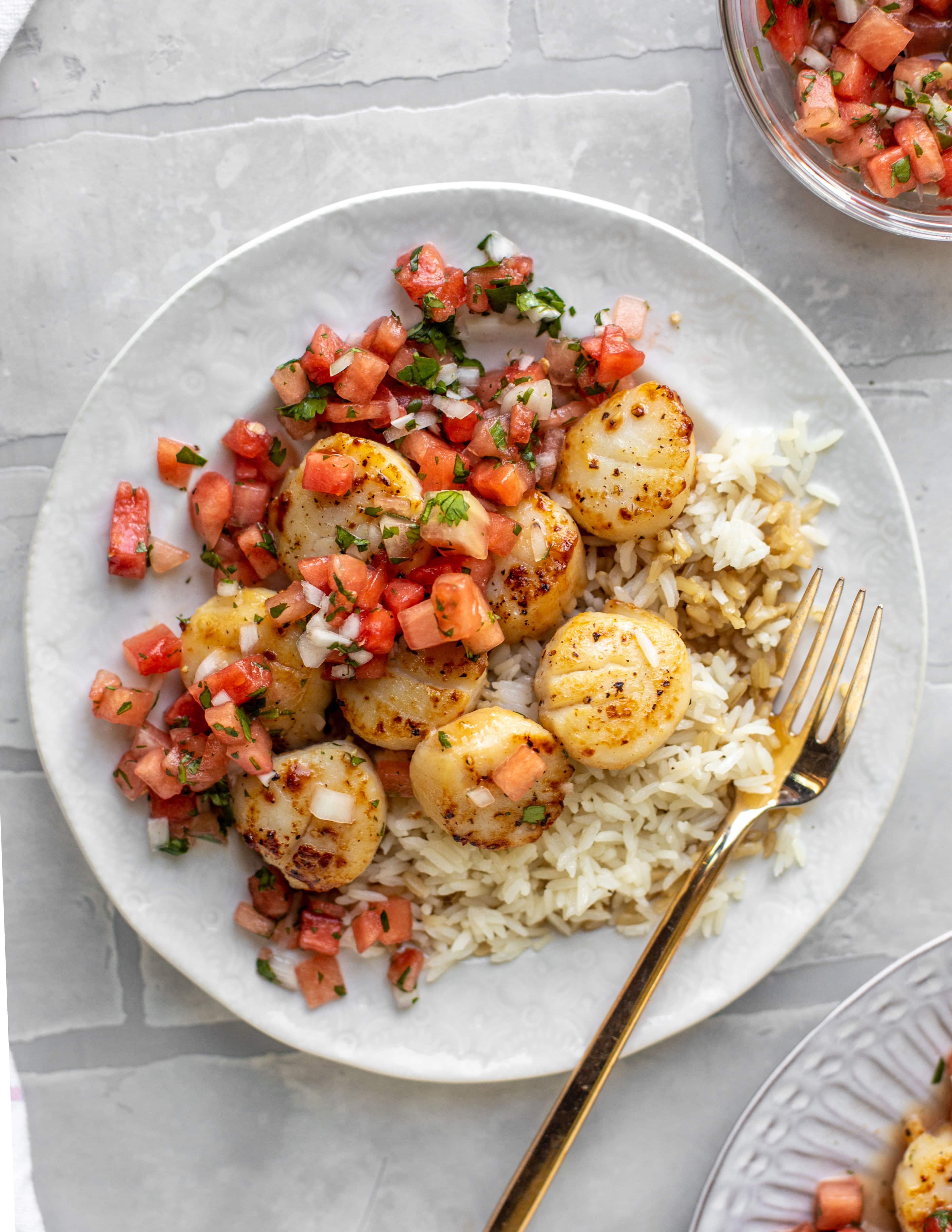 garlic butter scallops with watermelon salsa and rice