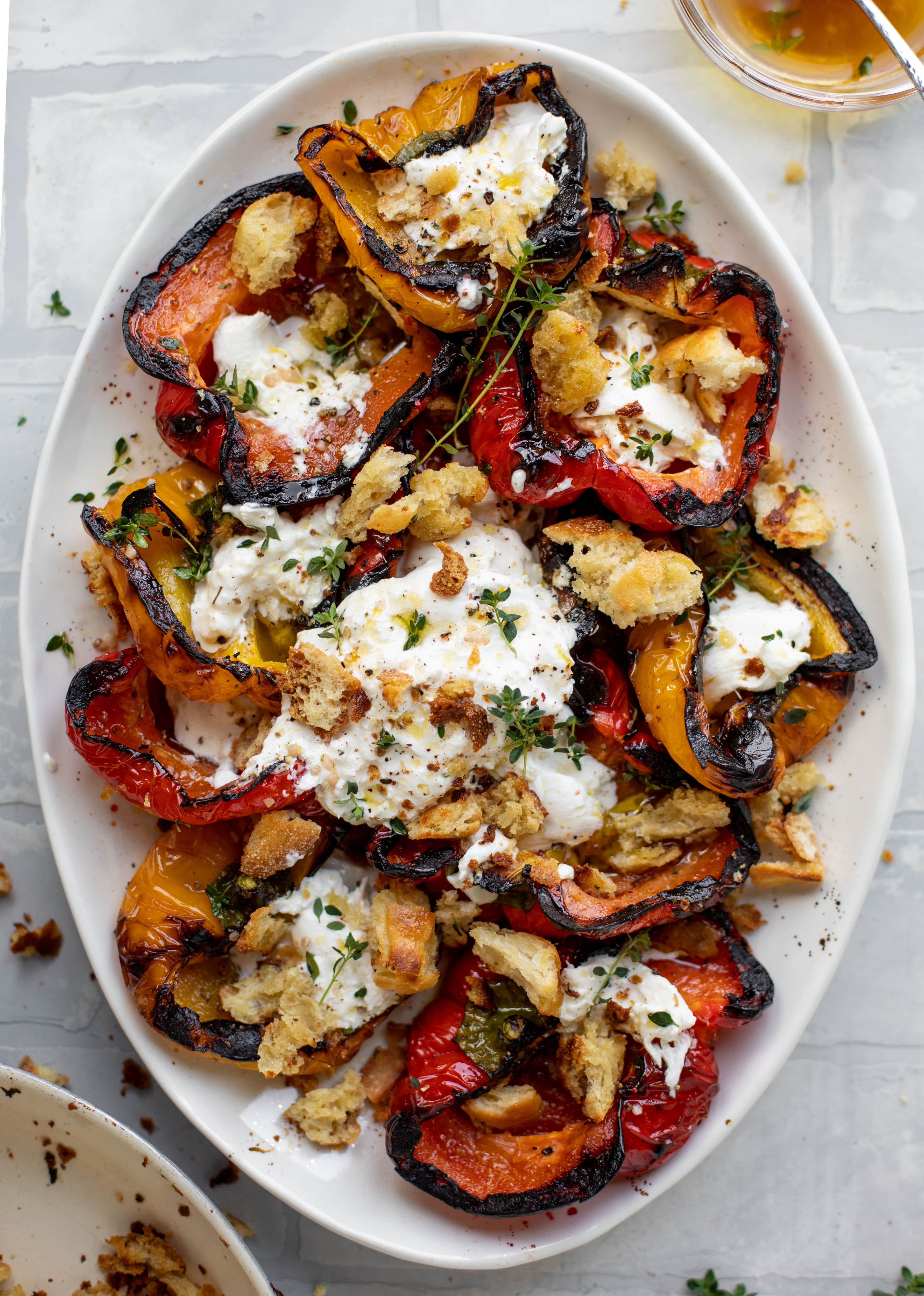 grilled peppers with burrata and sourdough breadcrumbs