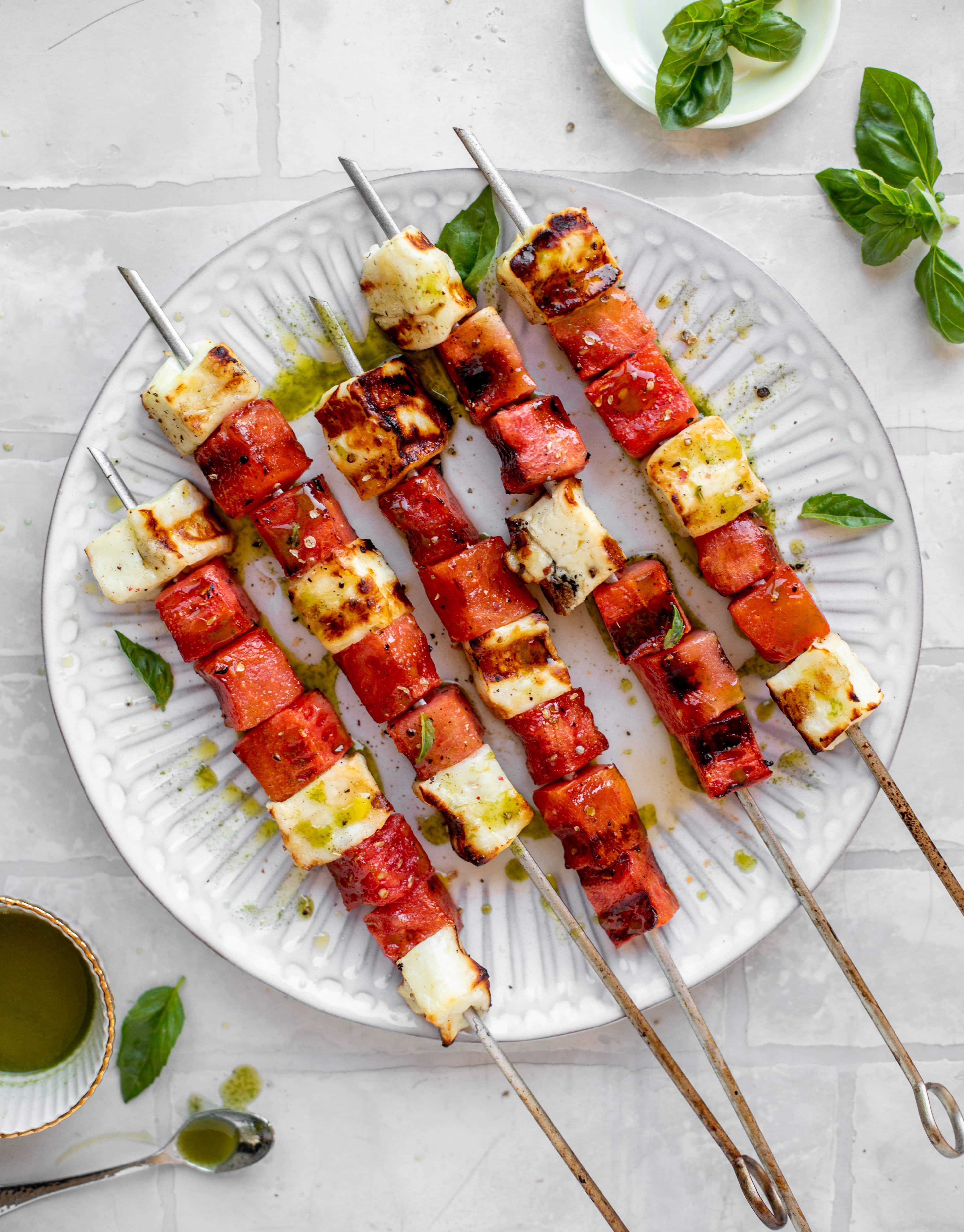 grilled watermelon halloumi skewers with mint basil oil