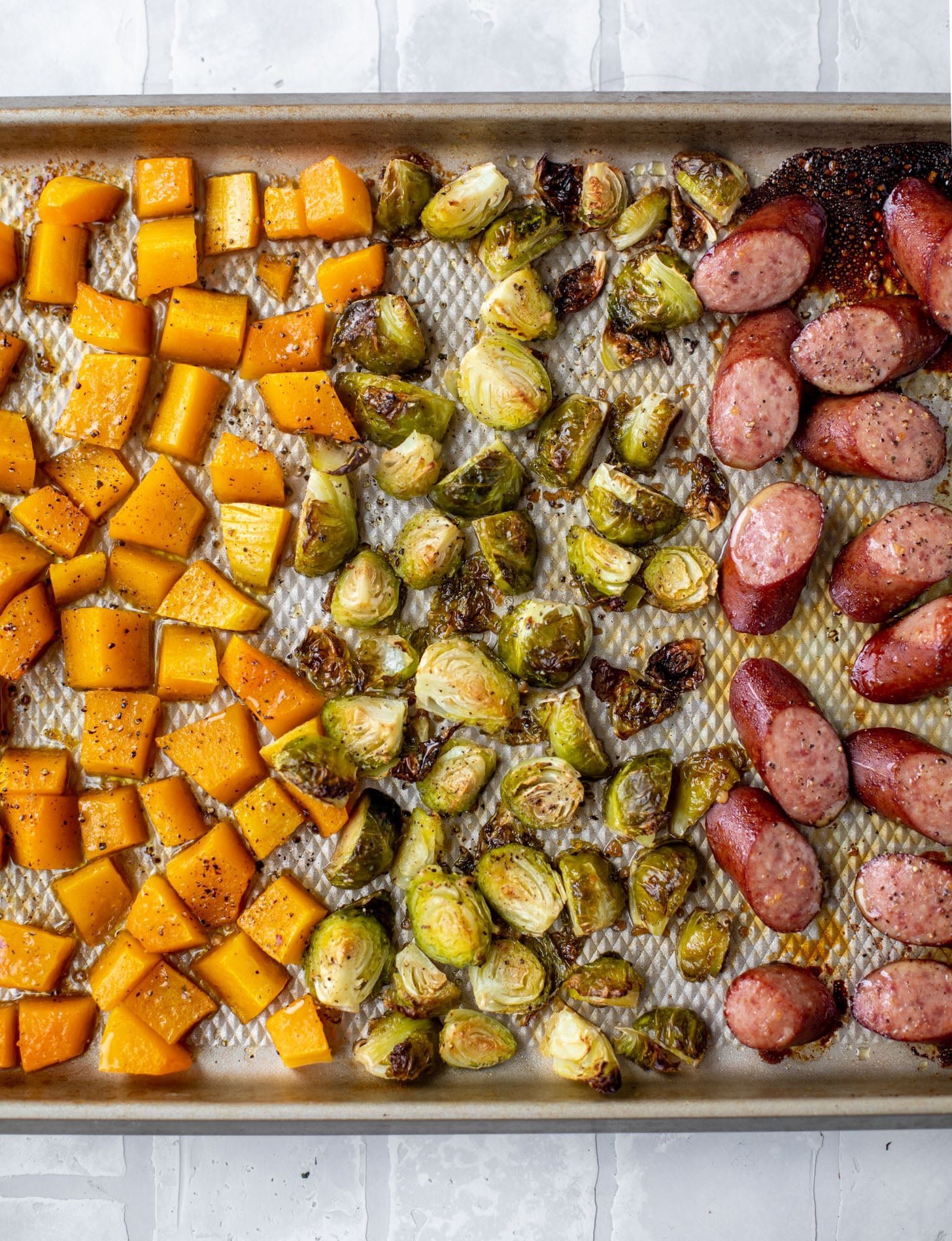 maple sheet pan smoked turkey sausage with butternut squash and brussels sprouts