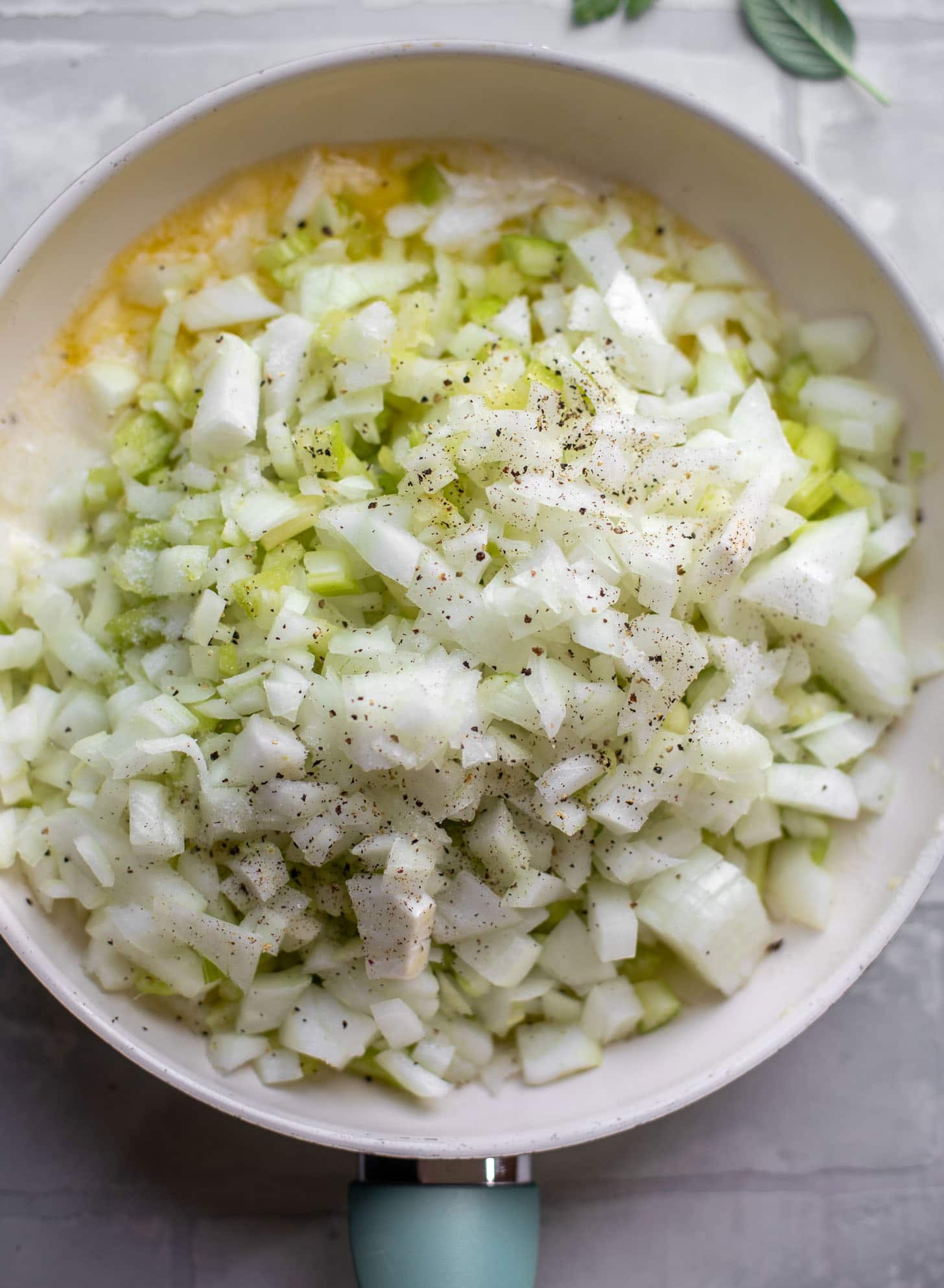 butter, onion, celery in a skillet