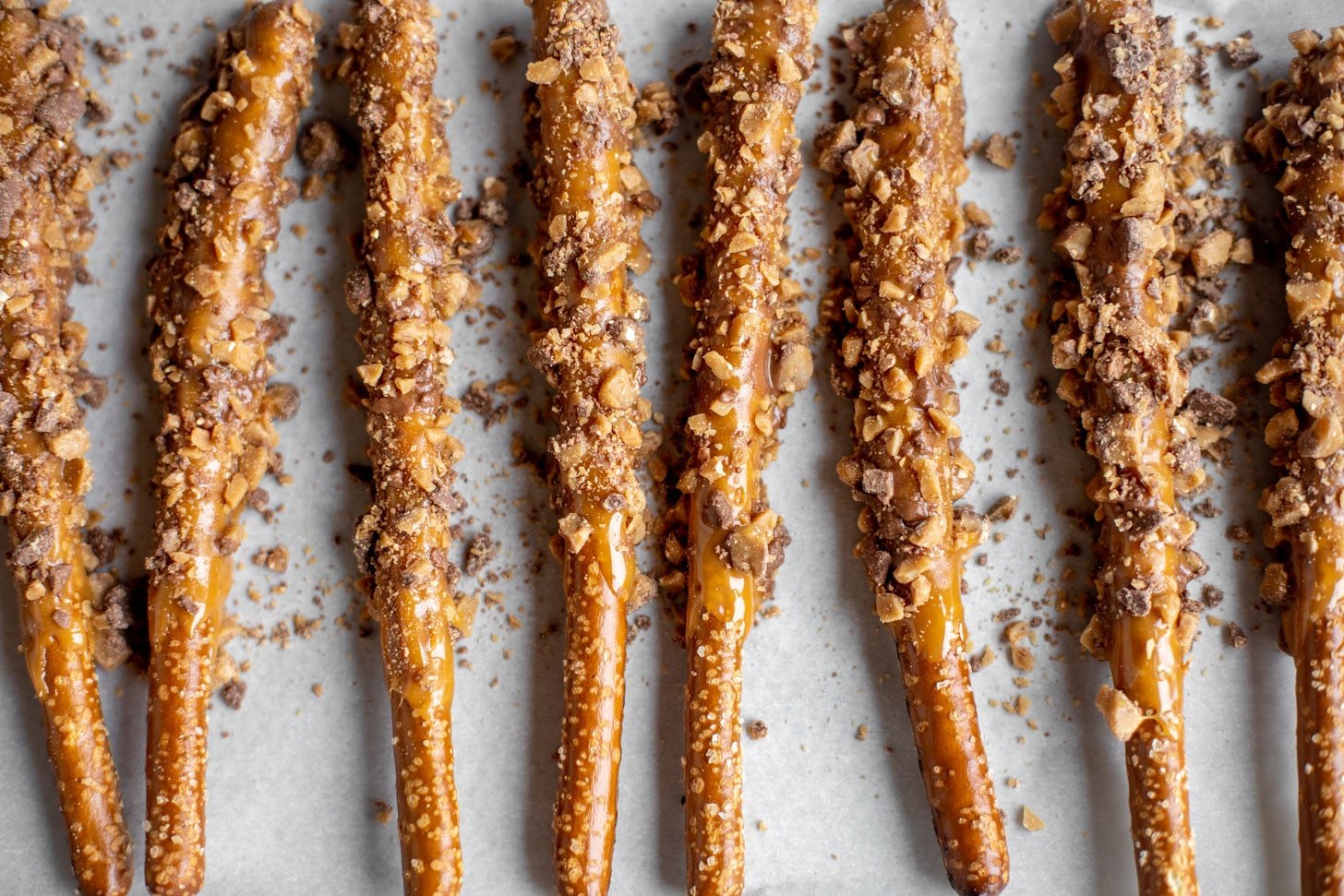 pretzels dipped in caramel and toffee