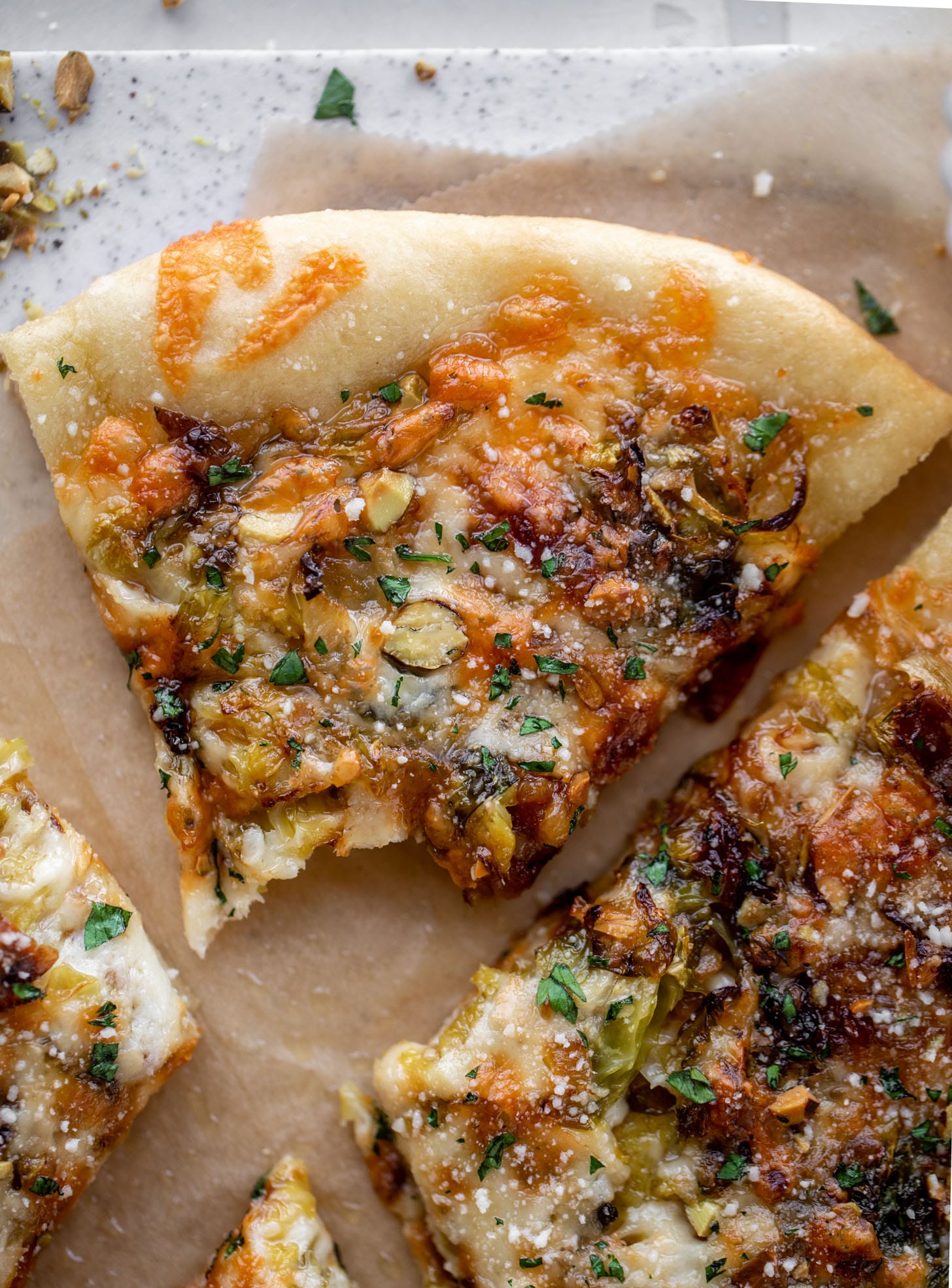 brussels, caramelized onion and pistachio pizza