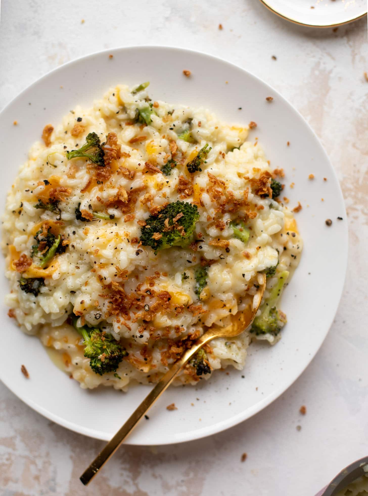roasted broccoli cheddar risotto with crispy onions