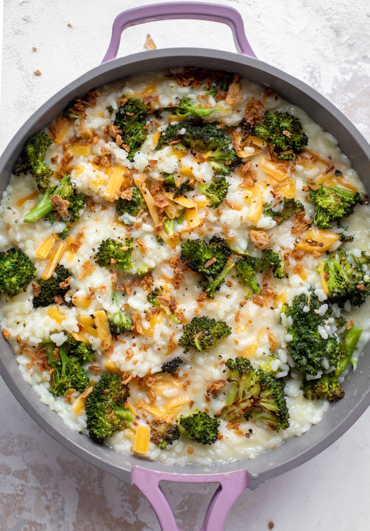 roasted broccoli cheddar risotto with crispy onions
