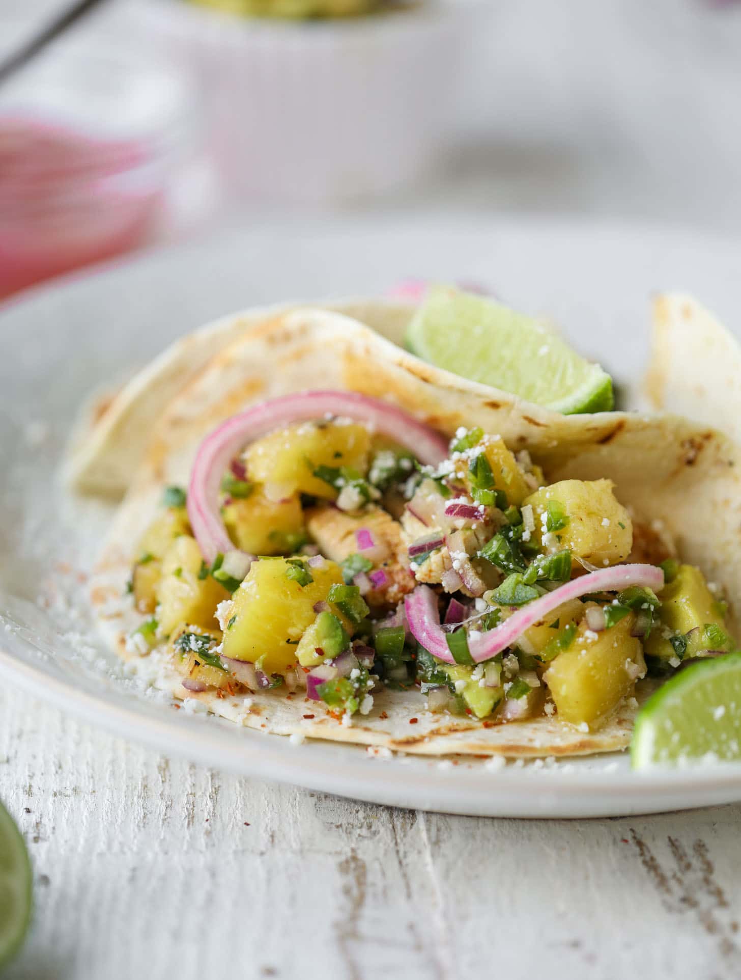 grilled chili lime chicken tacos with pineapple salsa and pickled onions