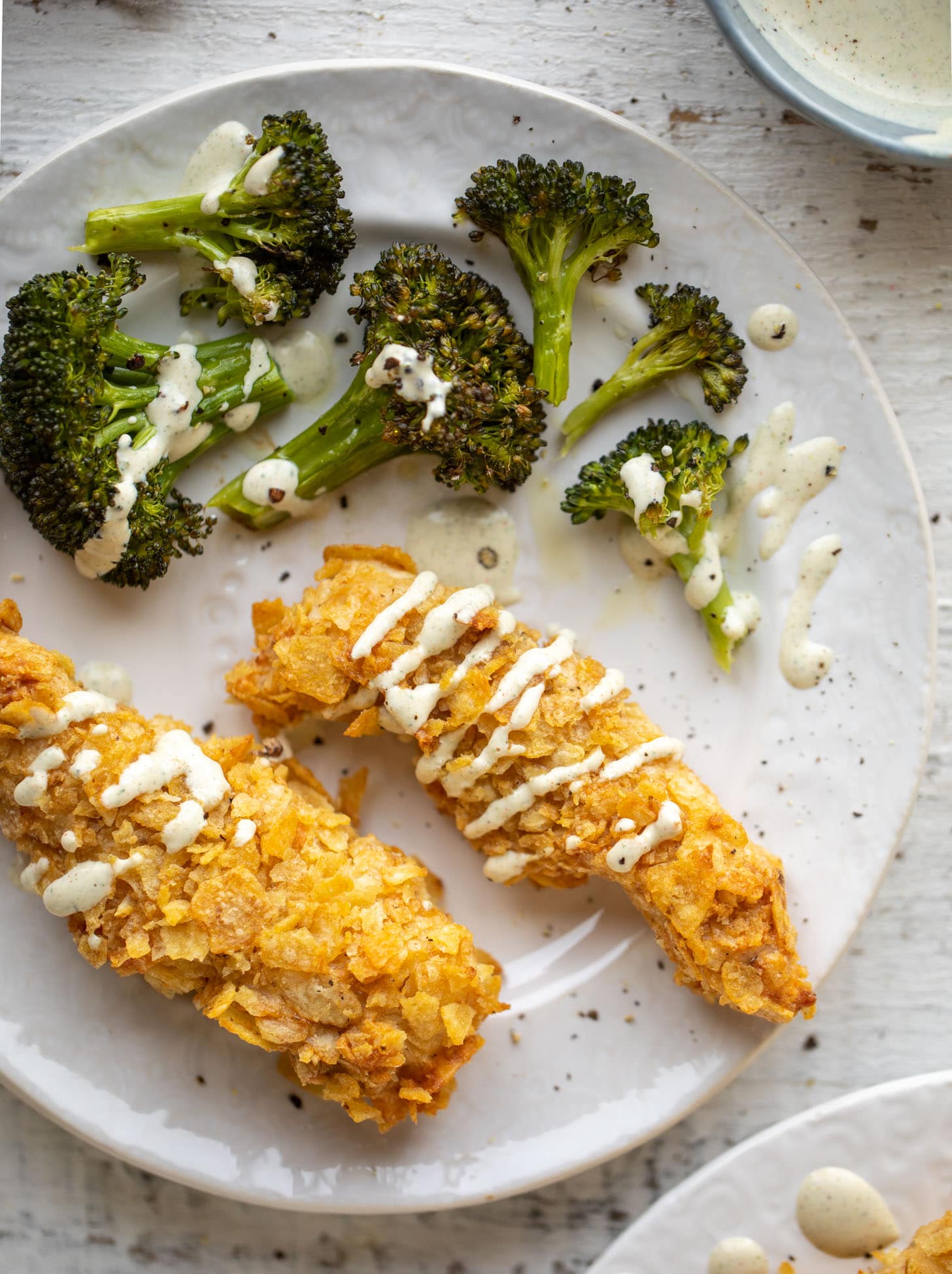 potato chip crusted chicken fingers with ranch and roasted broccoli