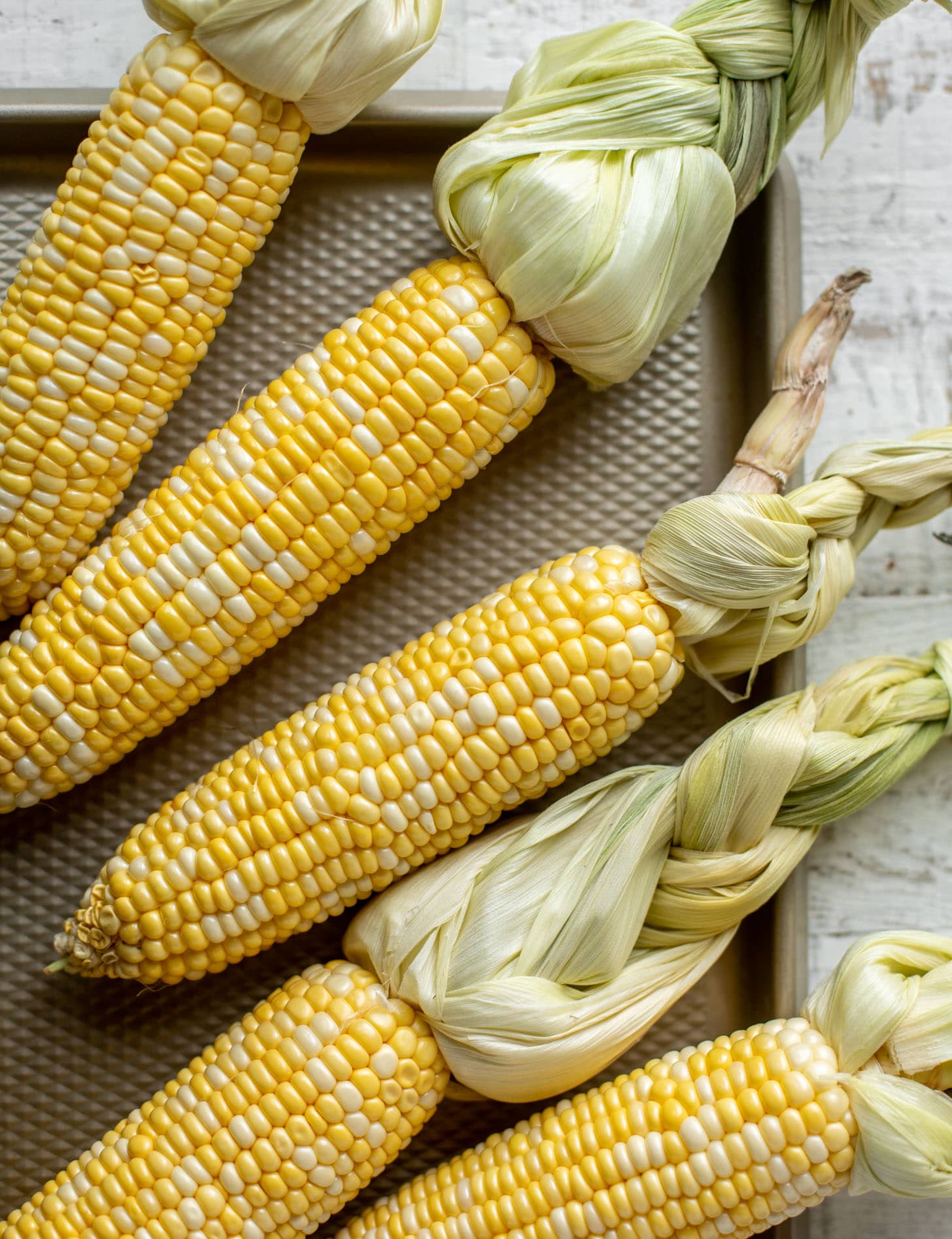 corn on the cob with braided husks