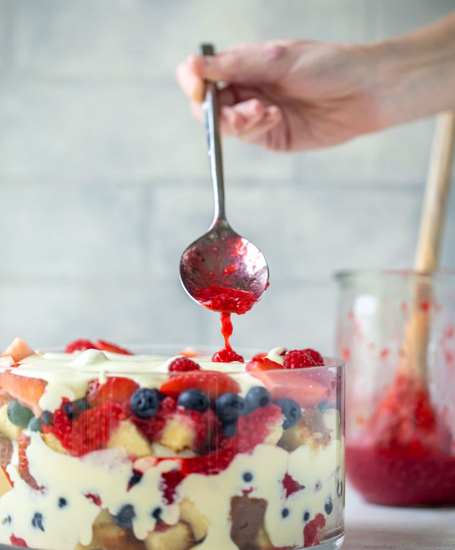 drizzle raspberry sauce on trifle
