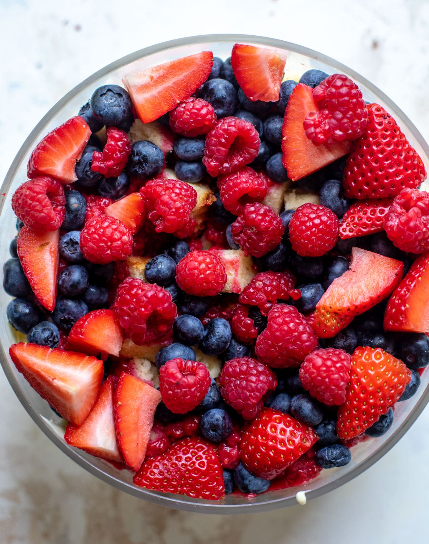 red white and blue berry trifle with raspberry sauce