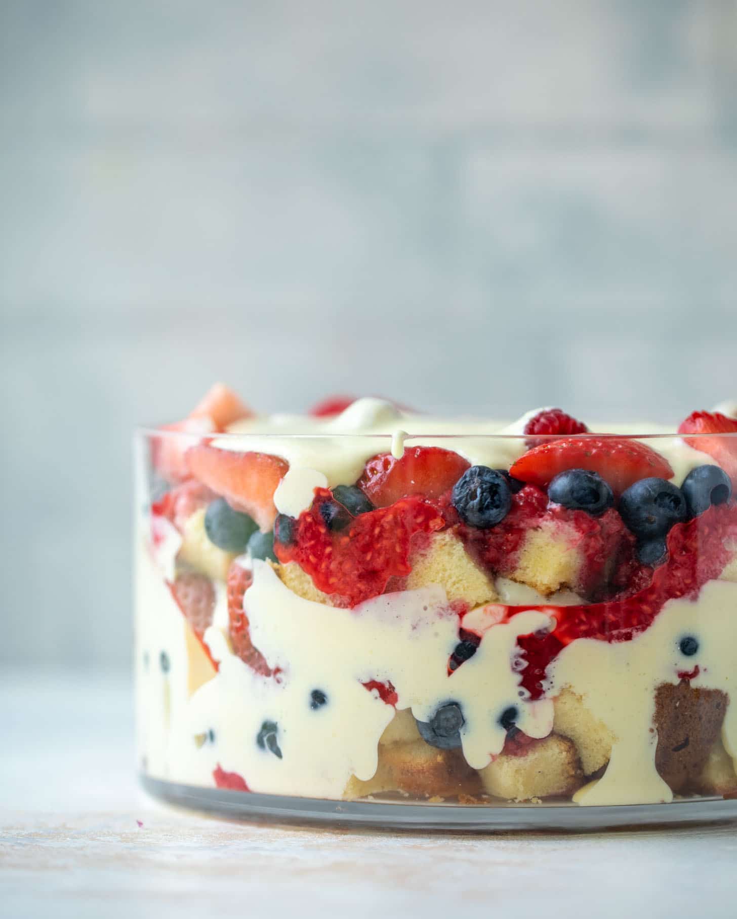 triple berry trifle with raspberry sauce