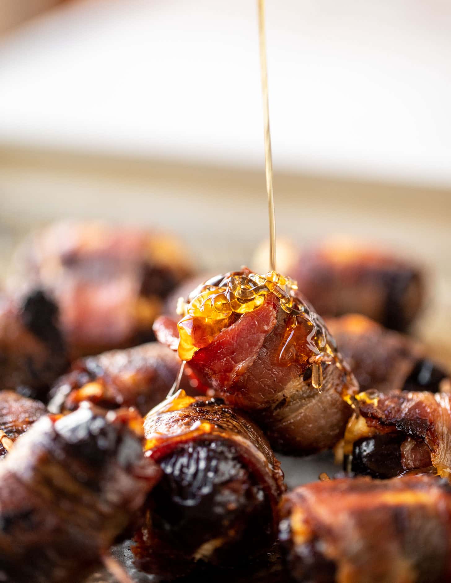 hot honey bacon wrapped goat cheese stuffed dates