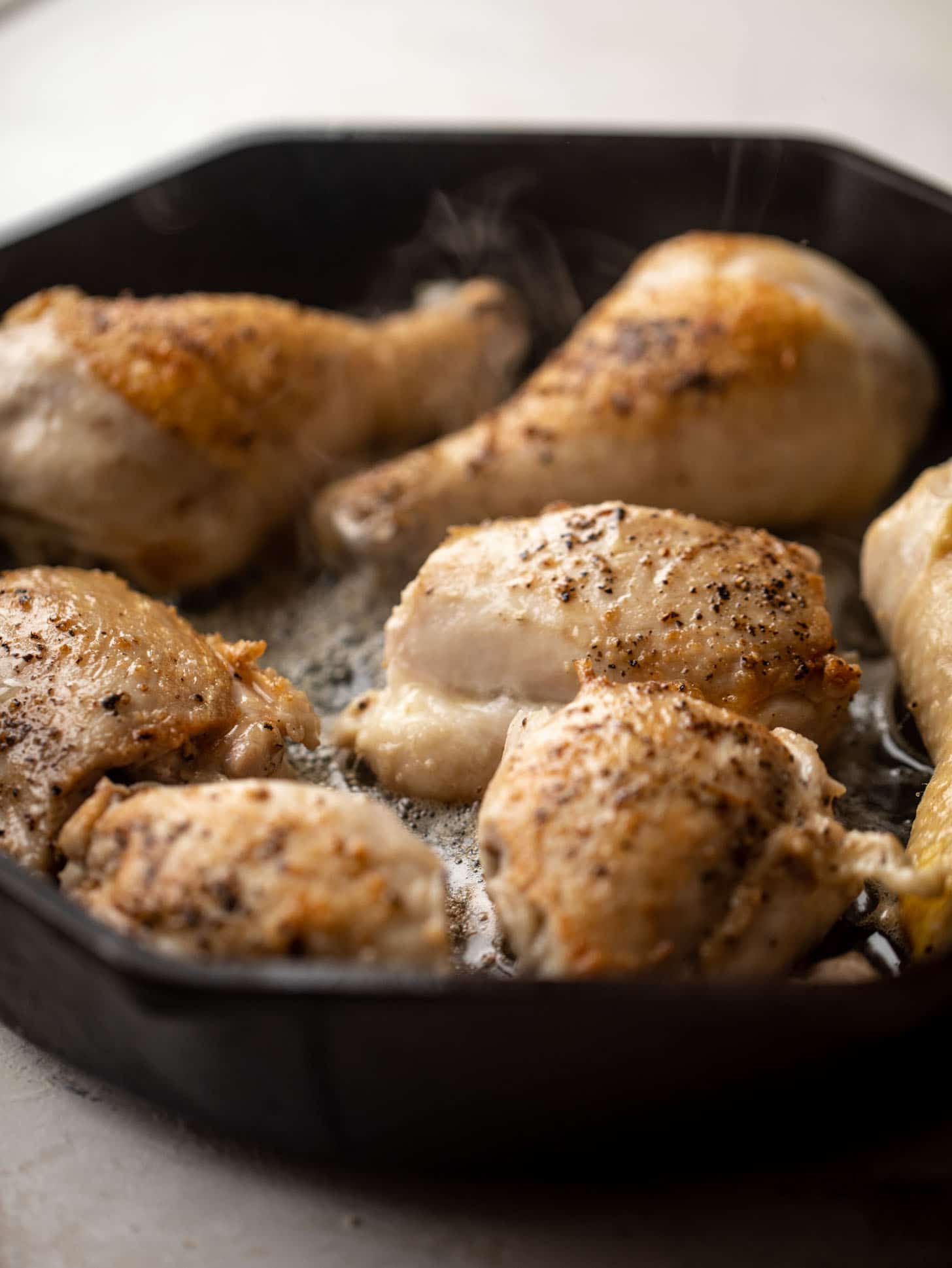 seared chicken in a cast iron skillet
