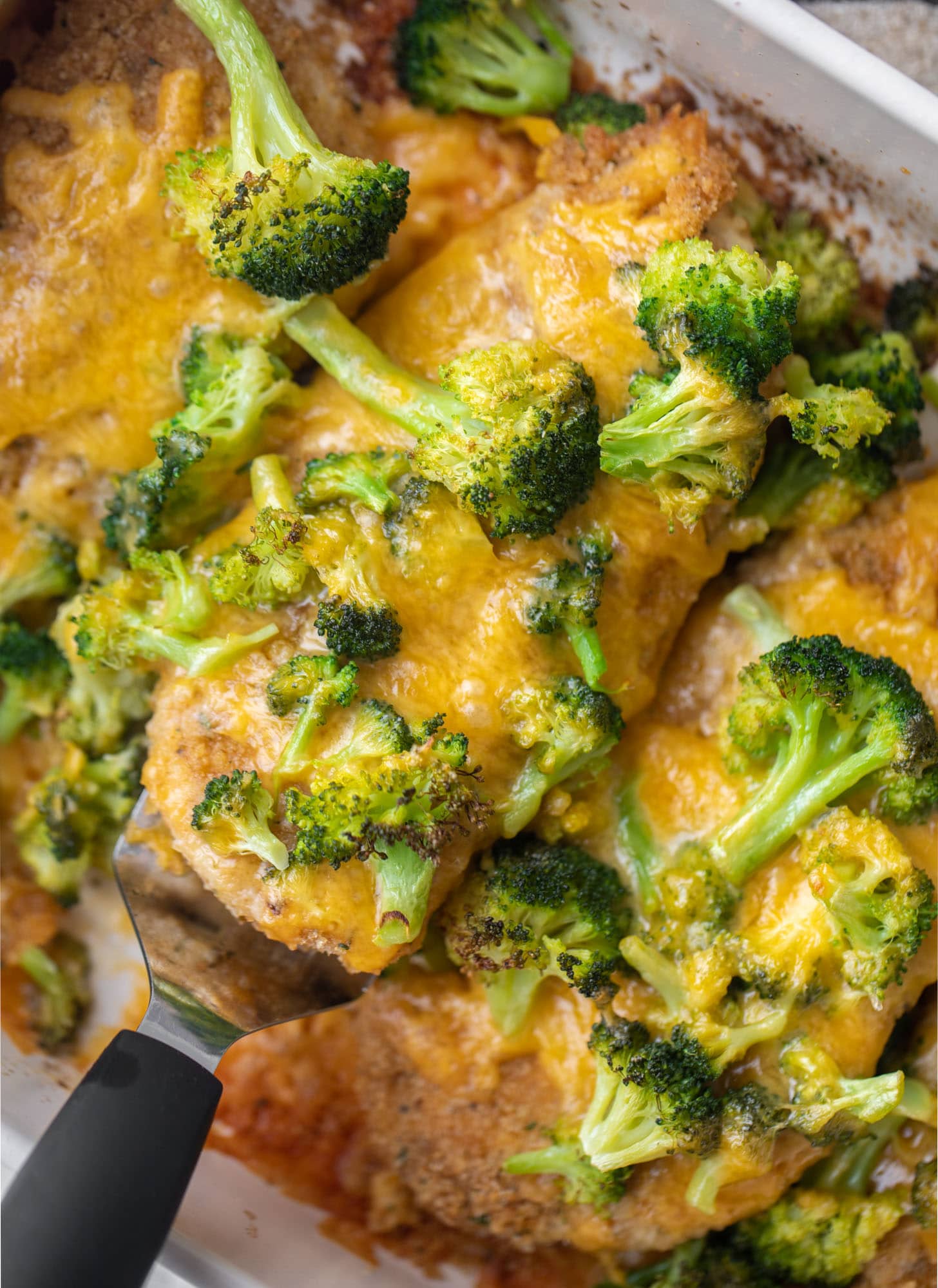 crispy broccoli cheddar melt chicken in a baking dish