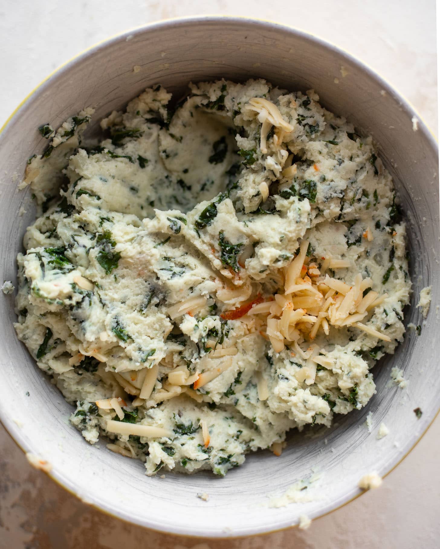 kale and smoked cheddar twice baked potato mixture