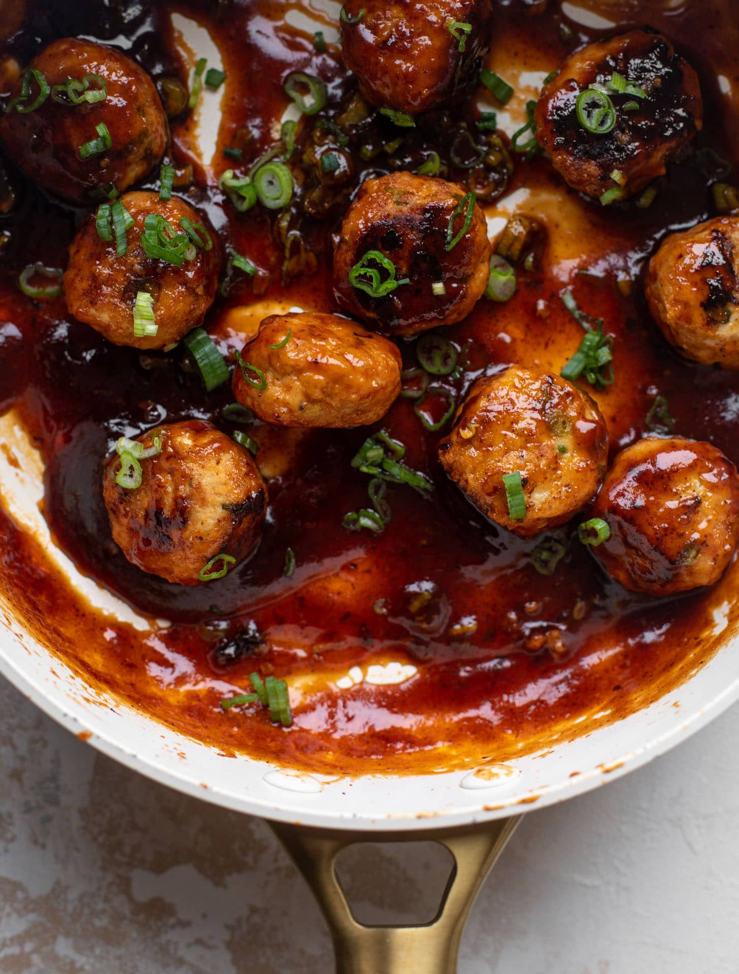 sticky BBQ chicken meatballs in a pan
