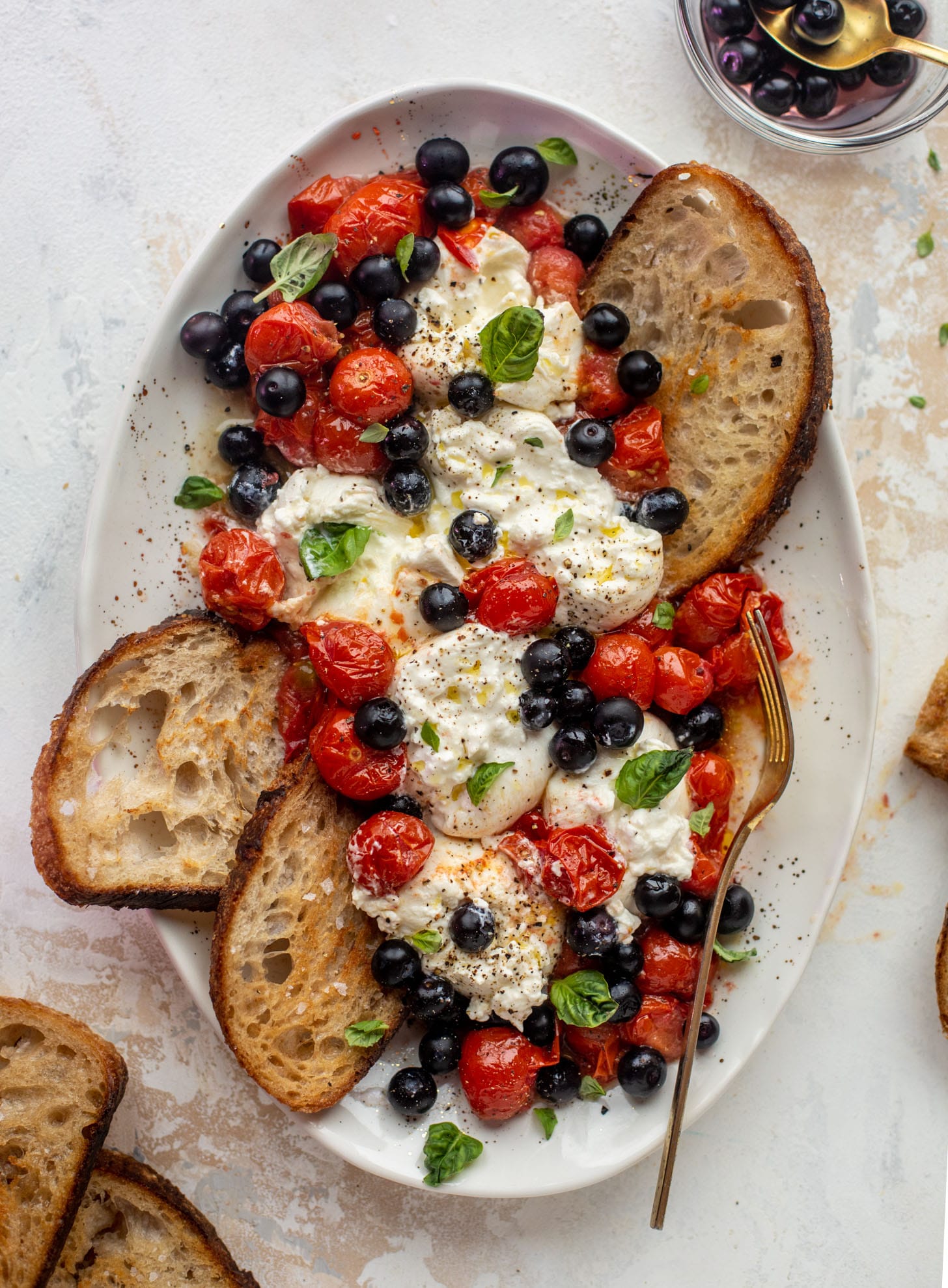 red white and pickled blueberry burrata platter