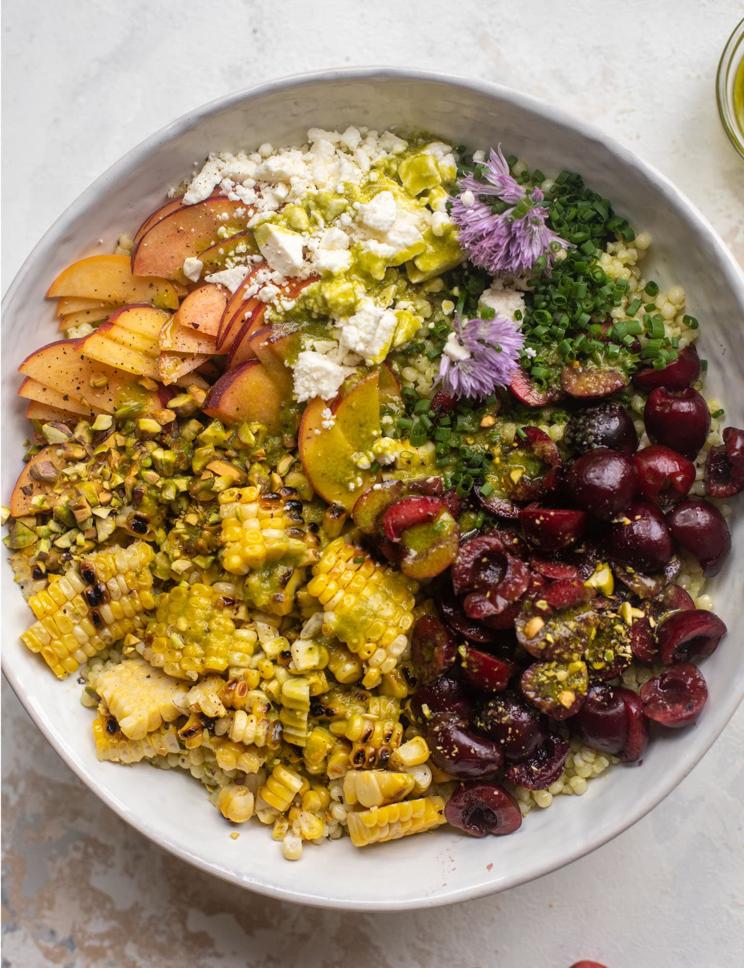 summer stone fruit couscous salad with cilantro lime dressing